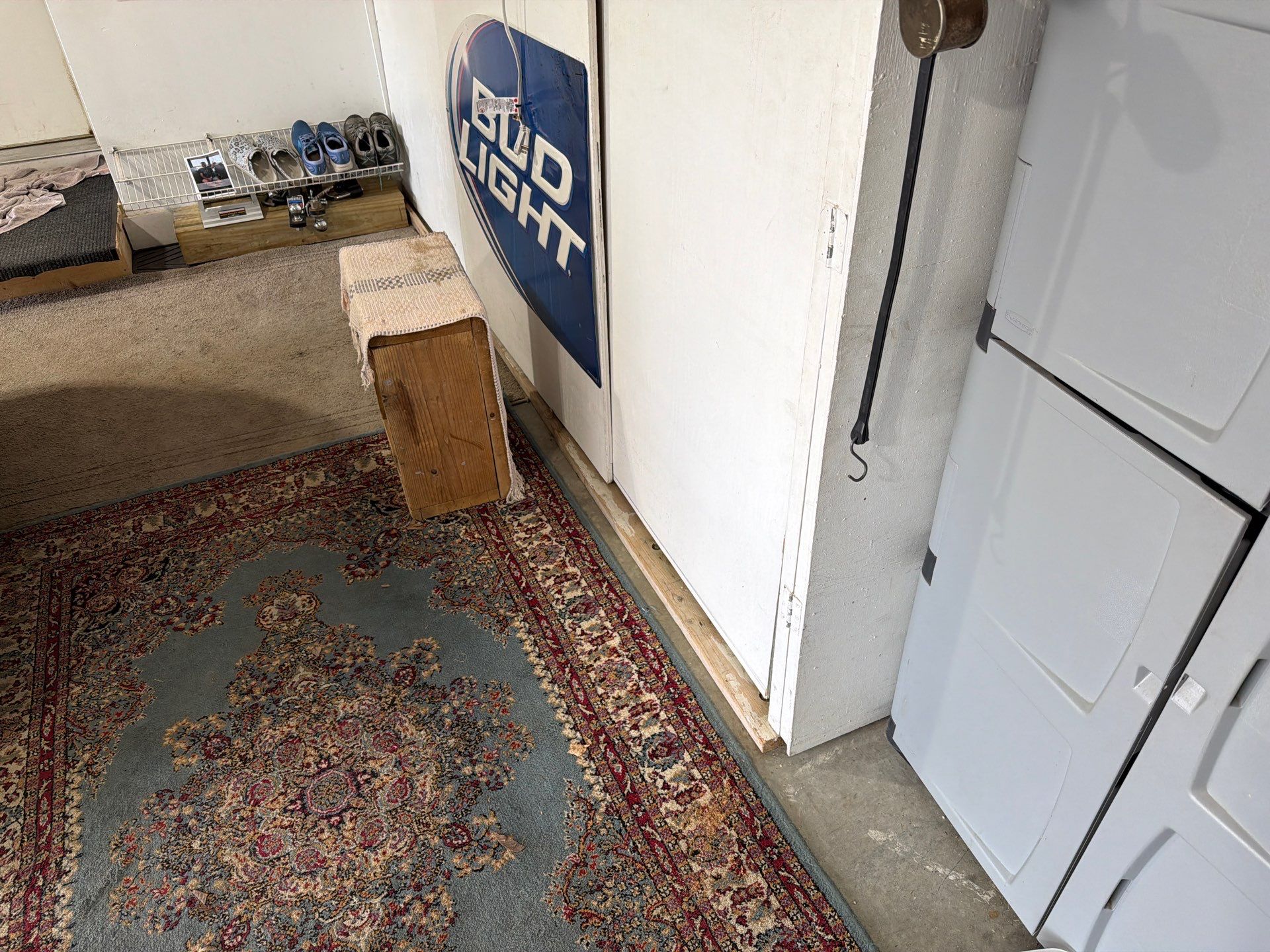 Residential Garage Floor Coating with Feather Grey Finish in Sioux Falls by Select Painting, Coatings & Garage Cabinets