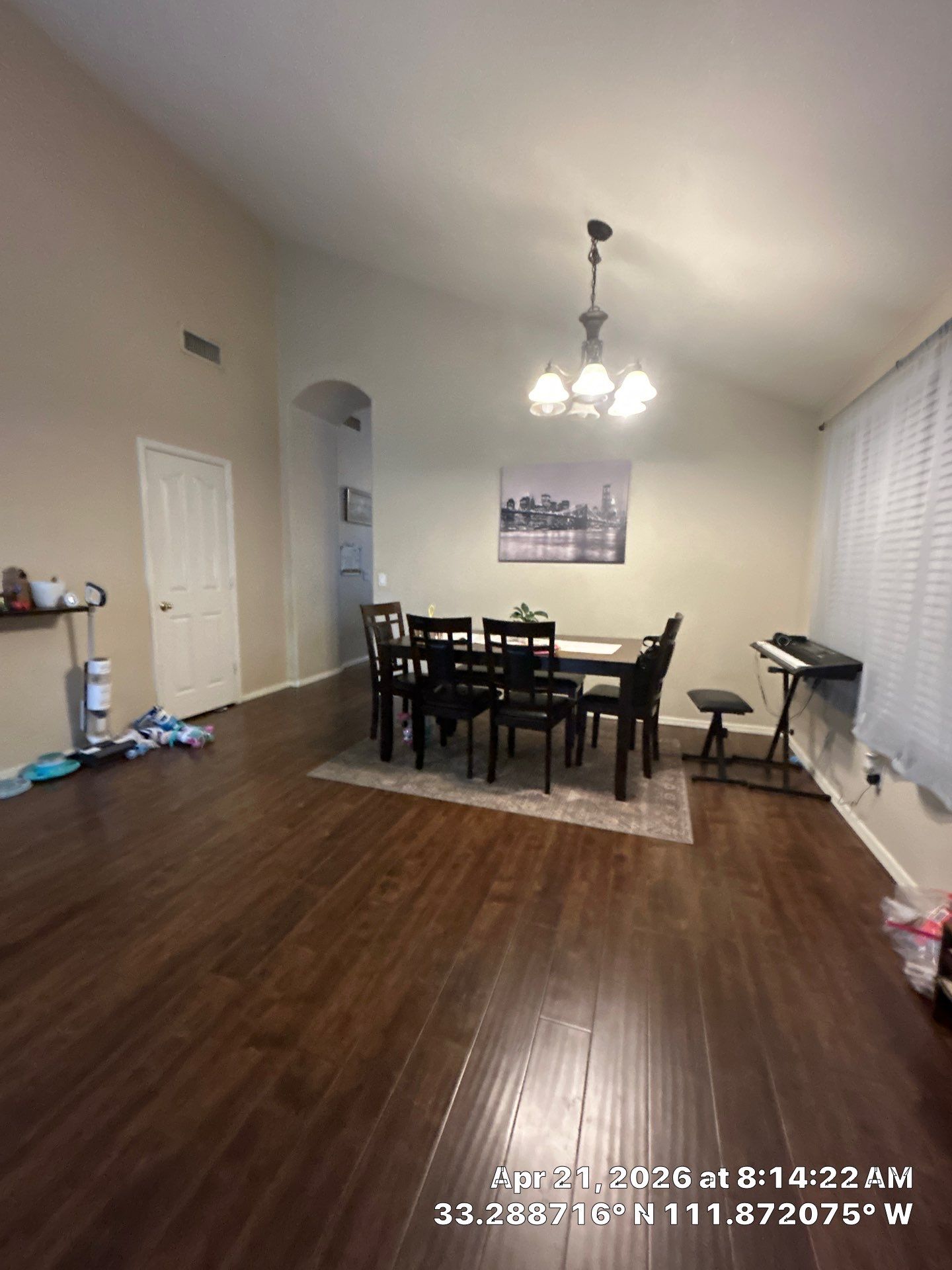 Dark Wood Laminate Floor Installation and Dining Room Renovation in Chandler by CompanyCam Sales Demo