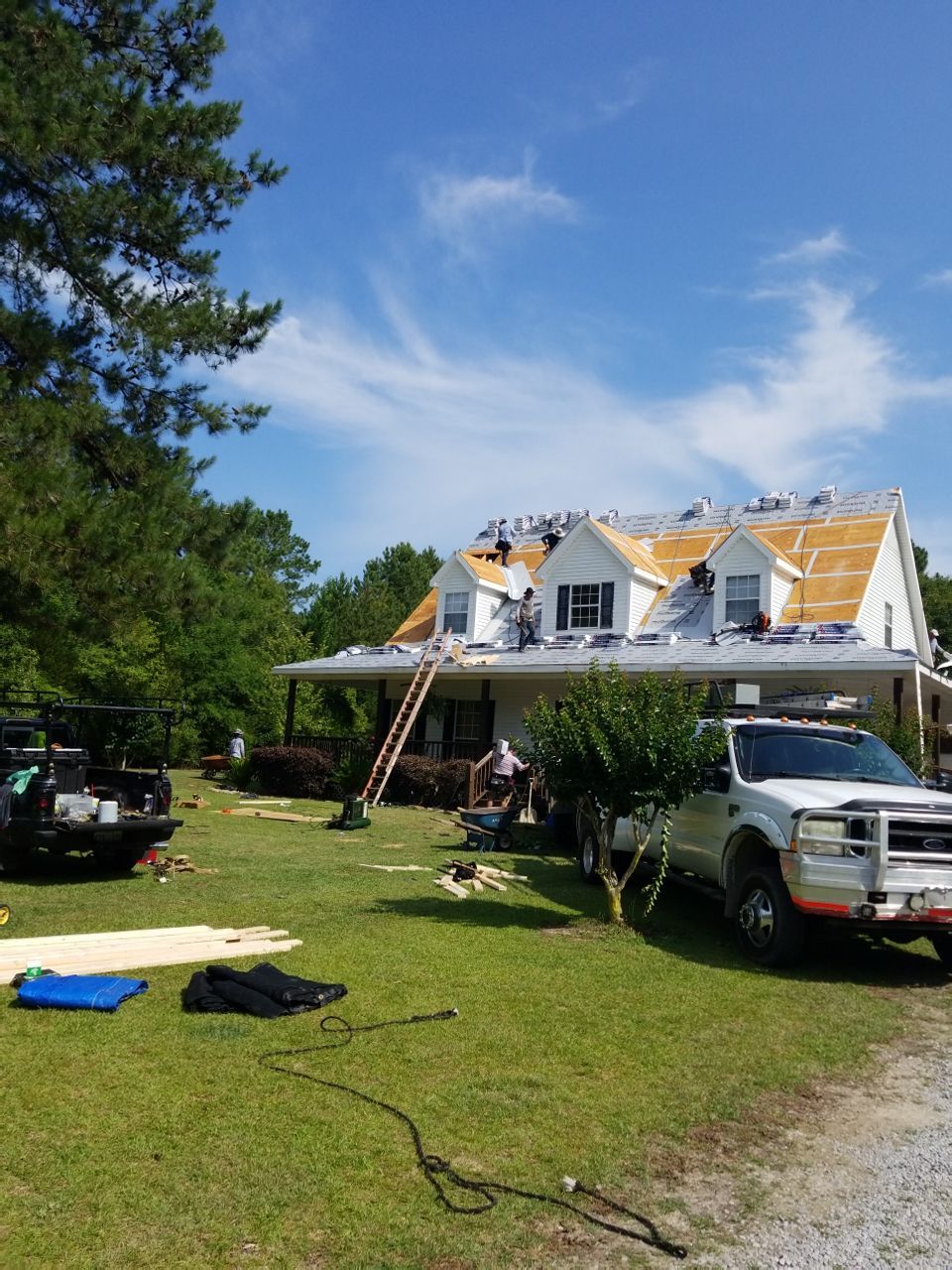 Residential Roofing Installation using Roof Replacement by American Roofing & Construction LLC