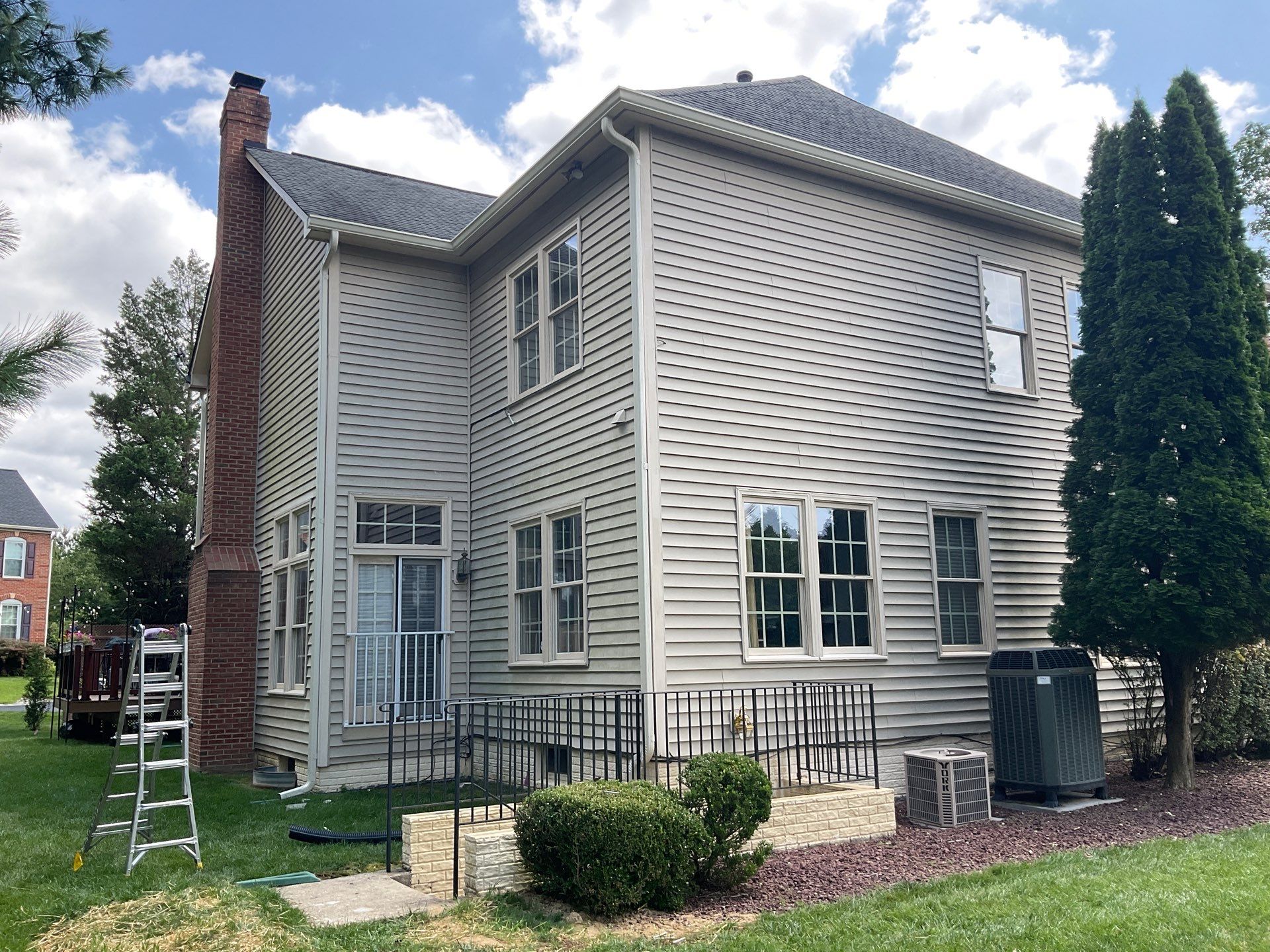 New Gutters, New Floor, New steps, New Paint job by Alpha Design Services