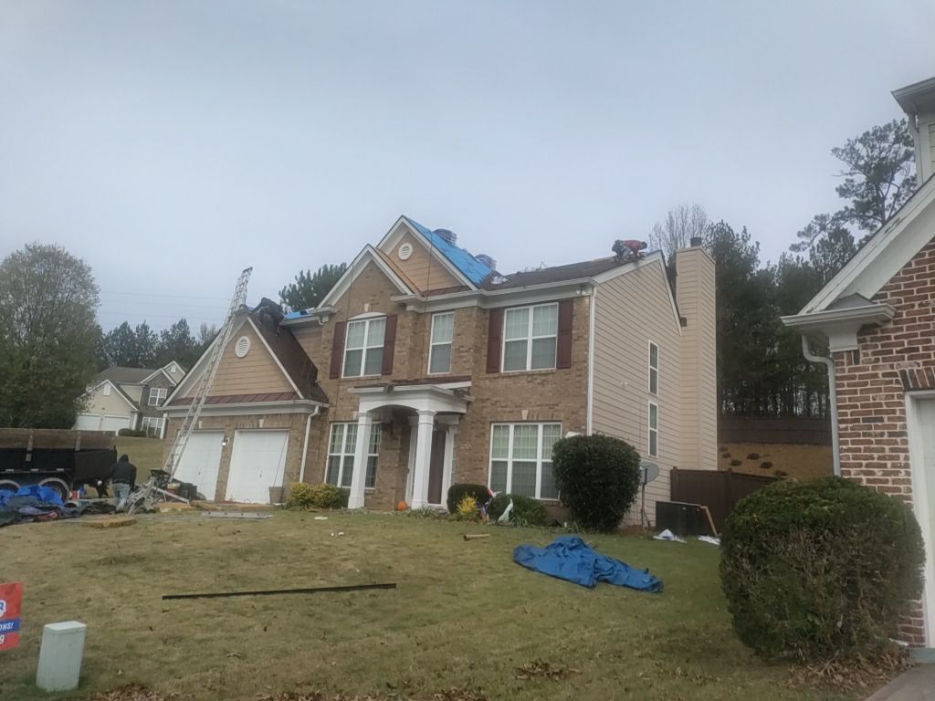 Residential Roofing Installation using Timberline HDZ Hickory  by Inspector Roofing and Restoration