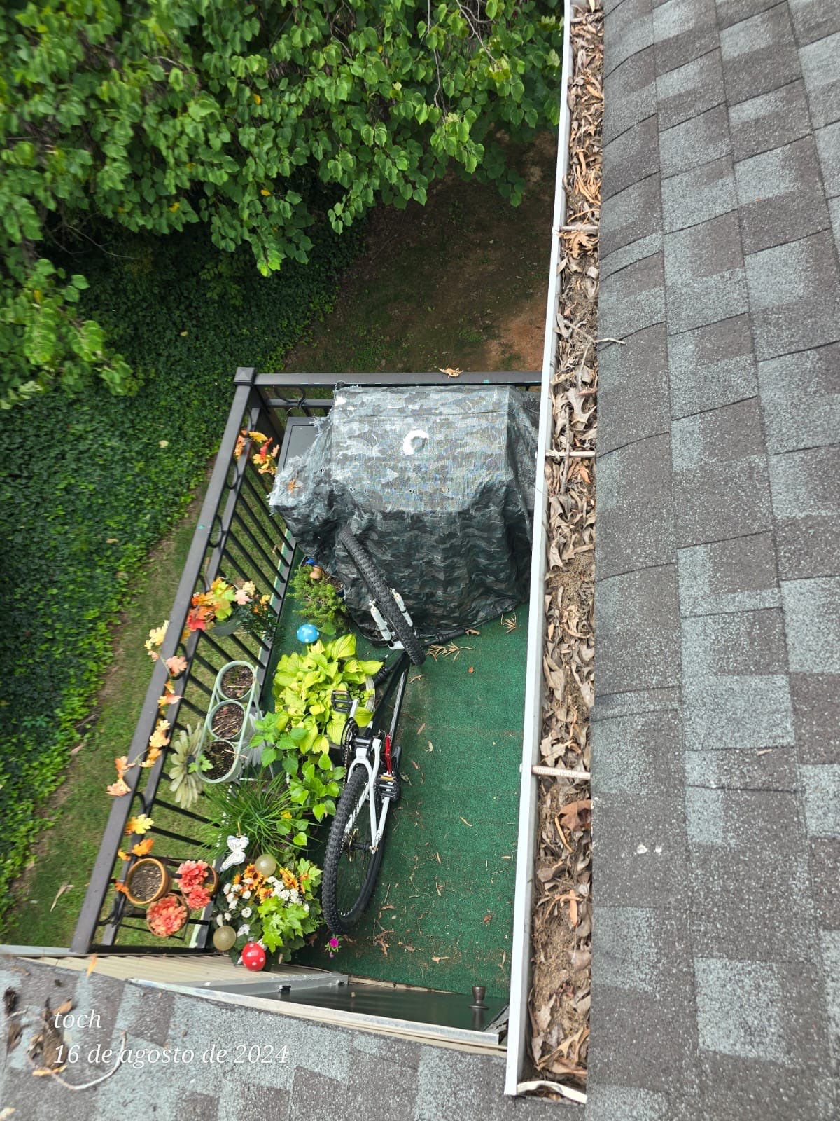 Commercial gutter cleaning High Point, NC before photo with filled gutters