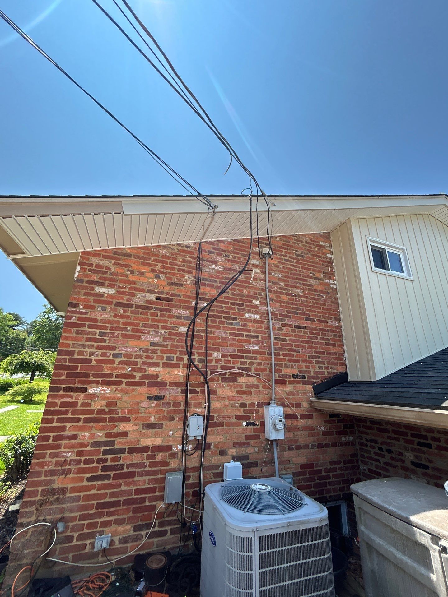 Fairfax: Residential Siding Replacement with CertainTeed 8" Board and Batten Siding in Desert Tan by RM Banning, Inc.