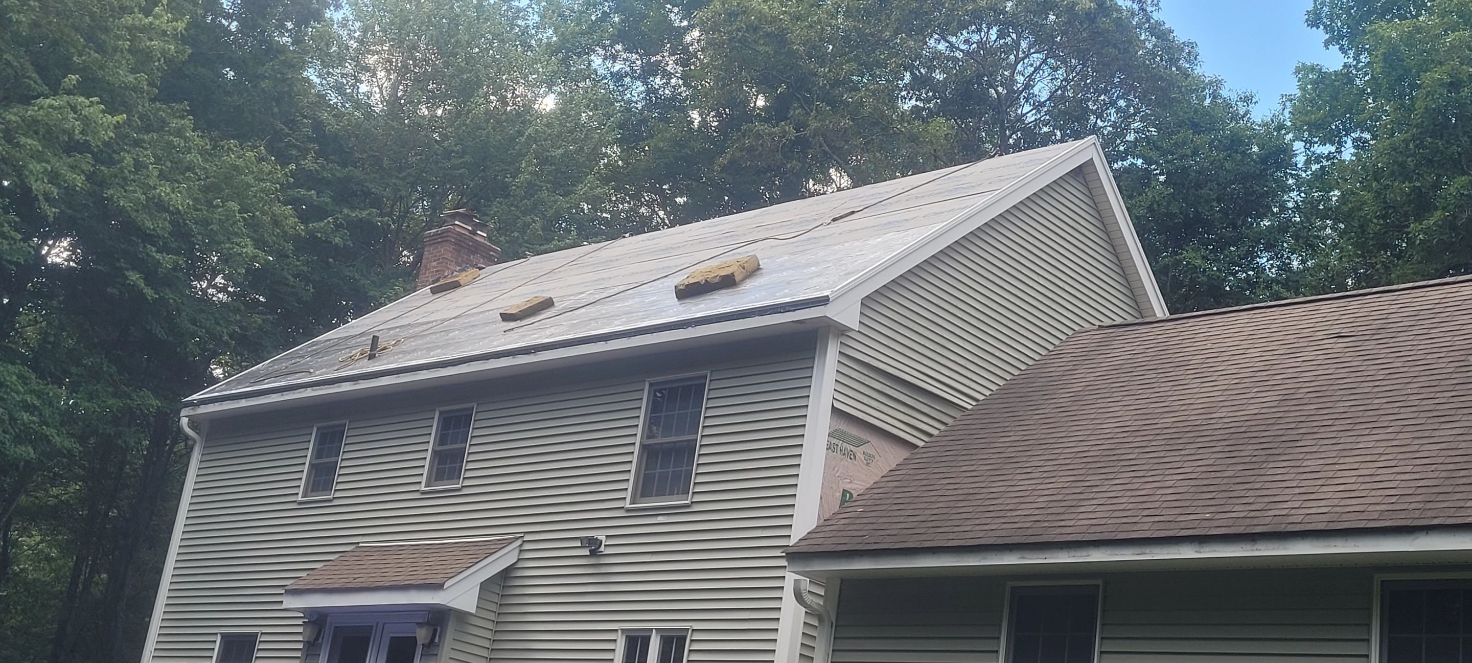 Homeowners in East Hampton, CT get a new roof by DiGiorgi by DiGiorgi Roofing and Siding Inc