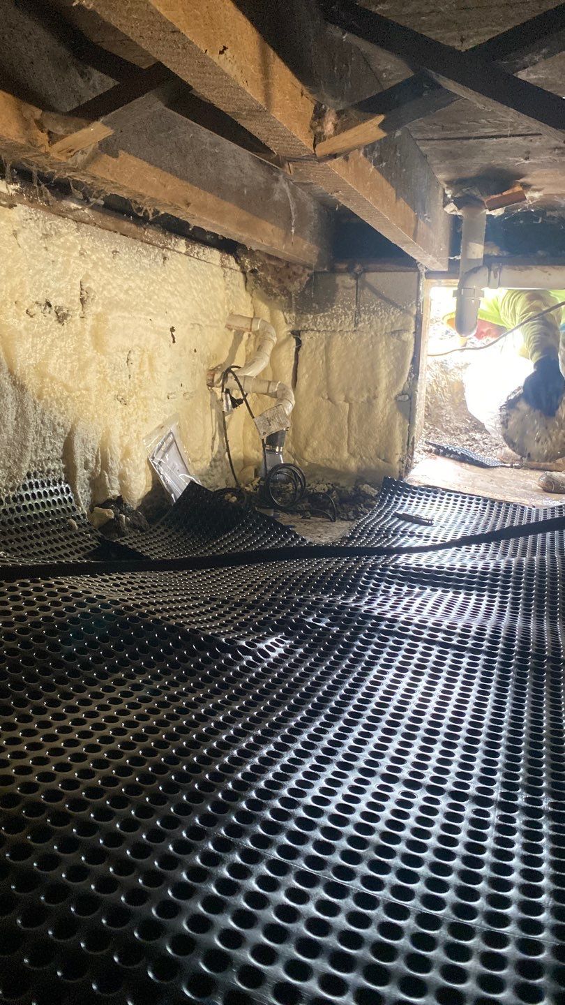 Crawl space encapsulation and Waterproofing using GrateDrain Waterproofing System by Toledo Basement Repair 