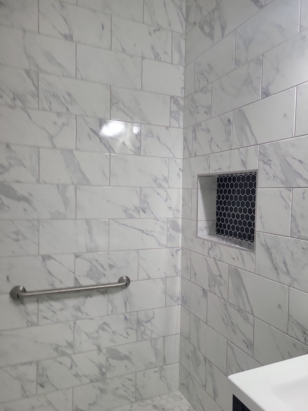 A Pathway to Possibility – Turning a Half Bath into a Full Retreat in Holly Springs by Elite Remodeling and Design LLC