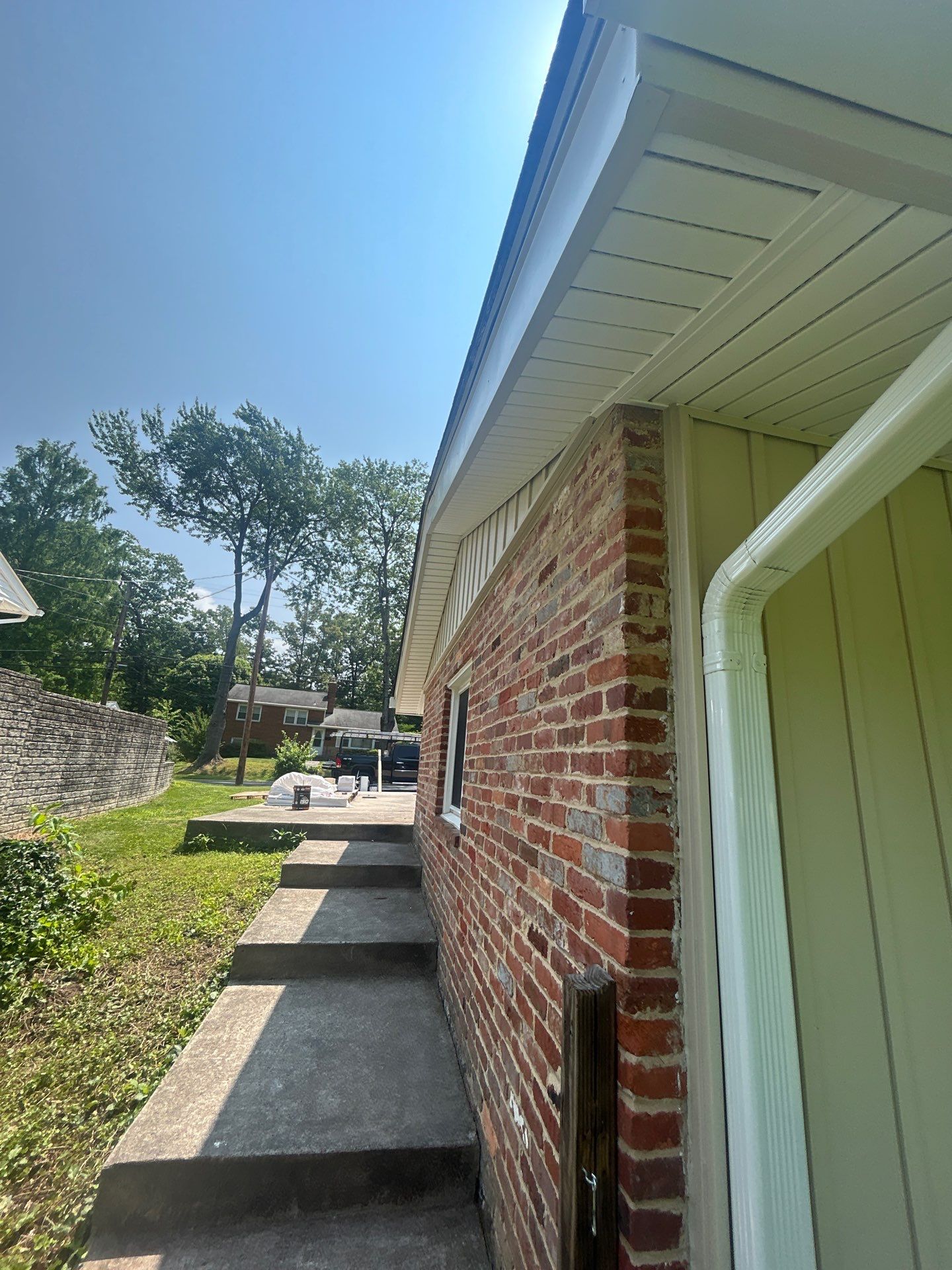 Fairfax: Residential Siding Replacement with CertainTeed 8" Board and Batten Siding in Desert Tan by RM Banning, Inc.