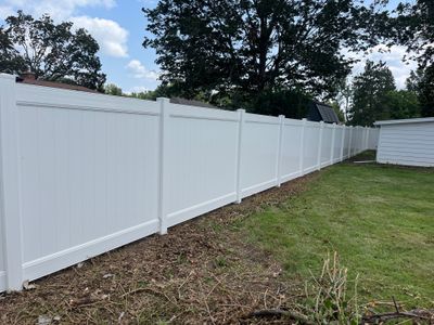 White Vinyl Privacy Fence Installation in Cedar Falls