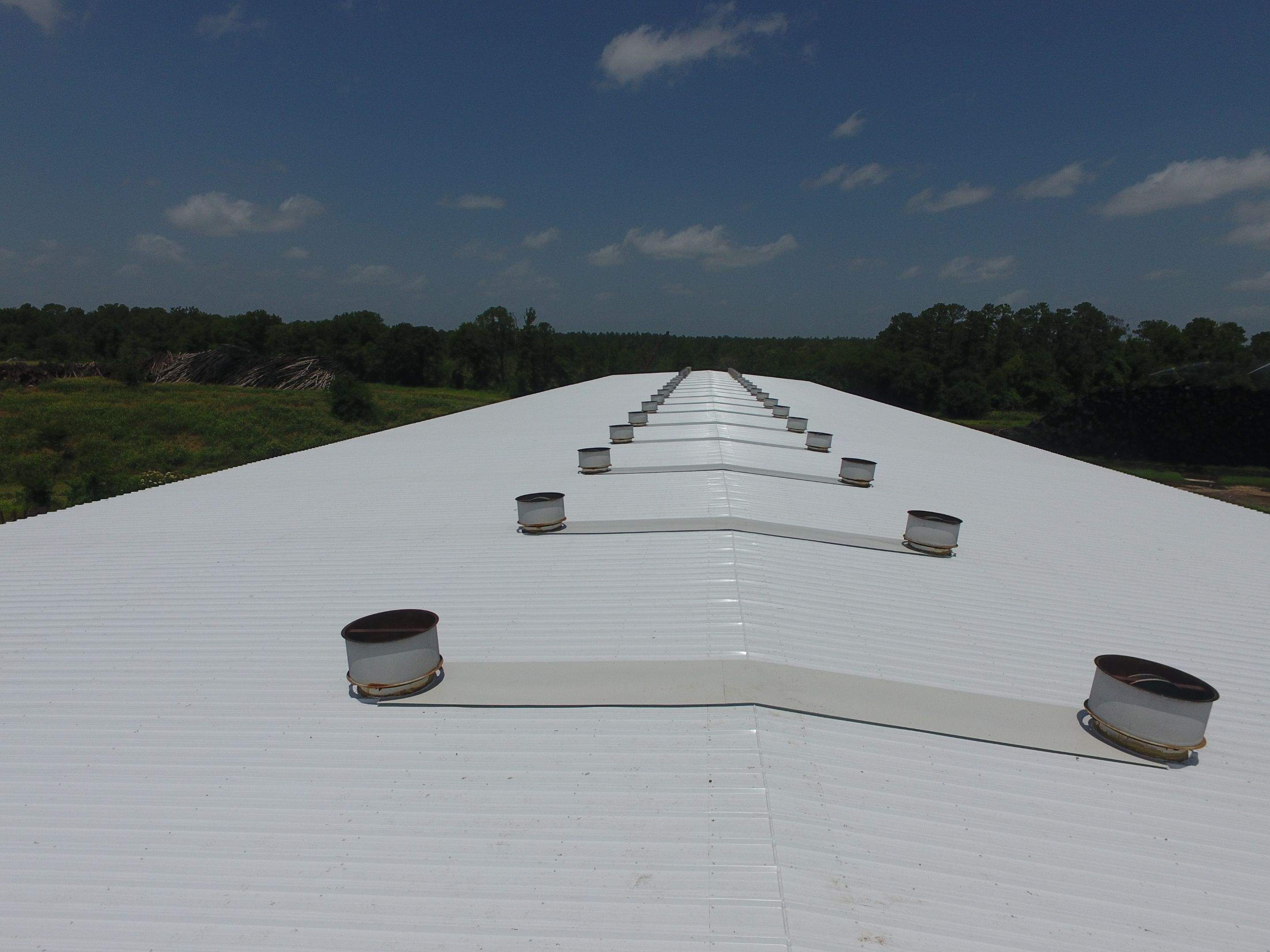 Commercial Roofing Installation using Aluminum Roofing panels by Hostetler Roofing