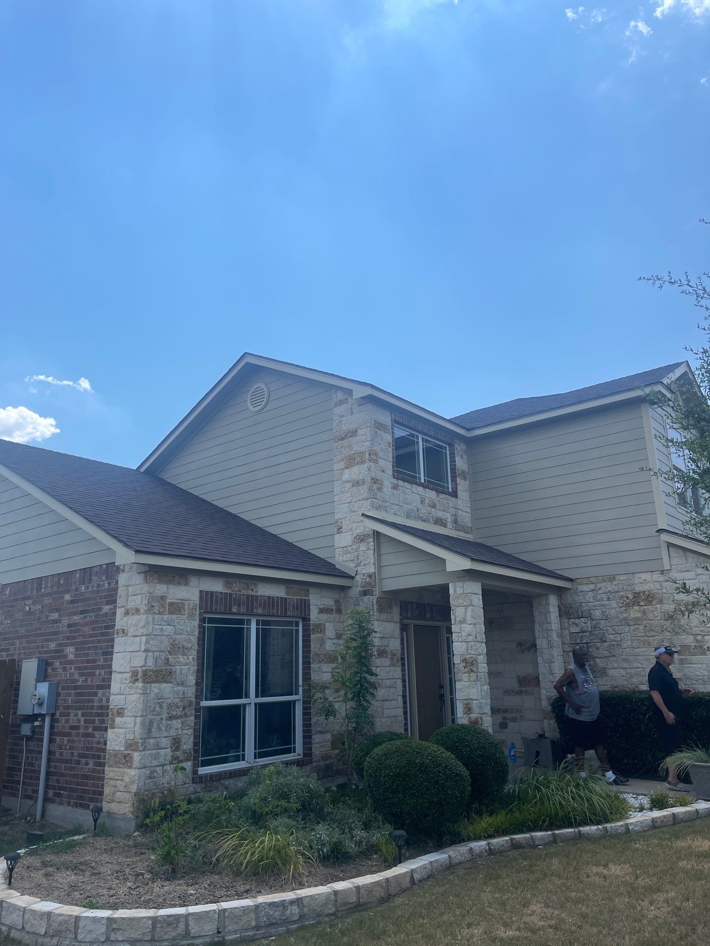 Residential Roofing Installation using Owens Corning Oakridge Brownwood by DeZign Roofing & Exteriors