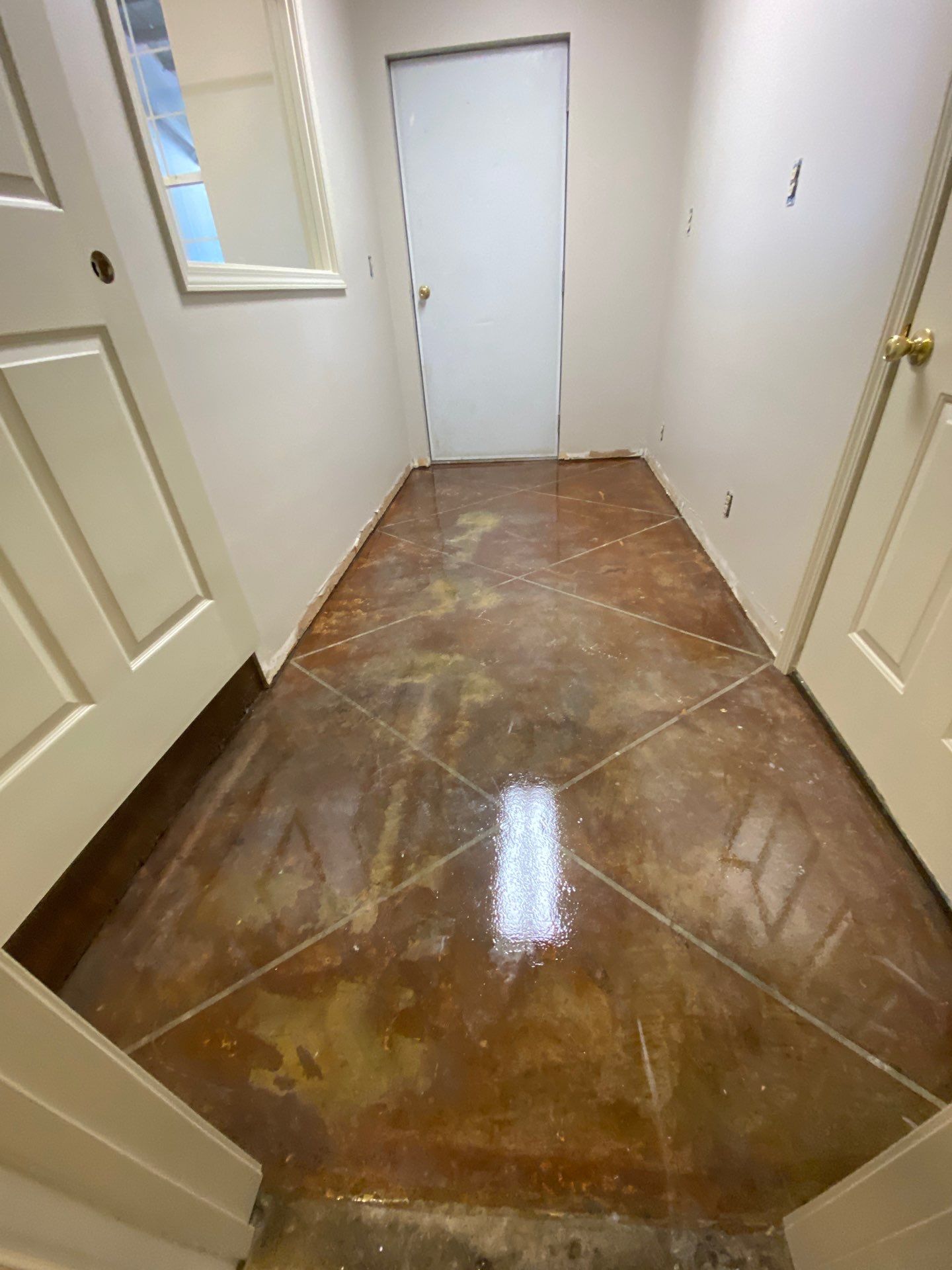 Resealed Concrete floors by Duncan Painting And Wallcovering