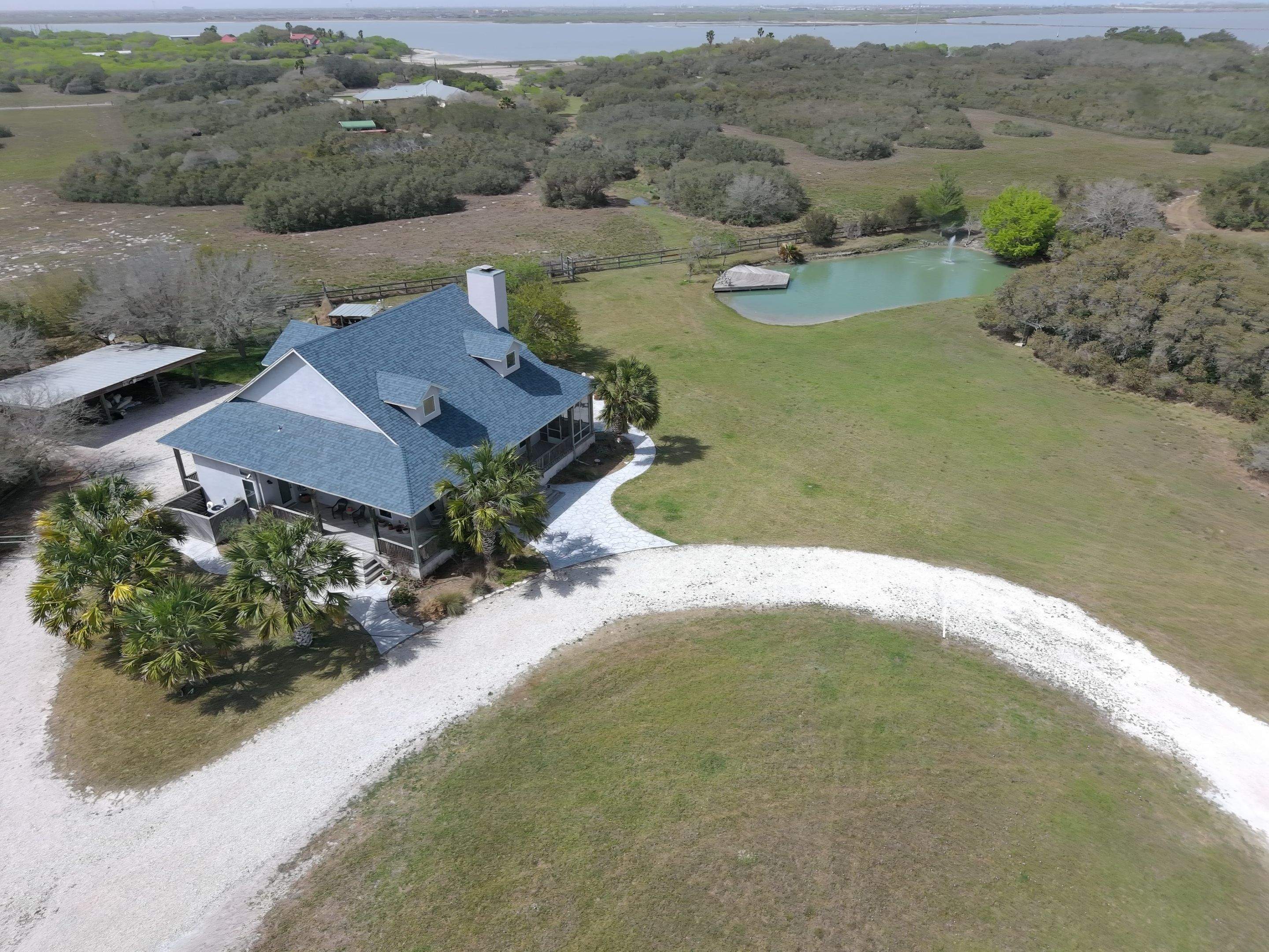 Long Horn Retreat by Bayfront Roofing and Construction