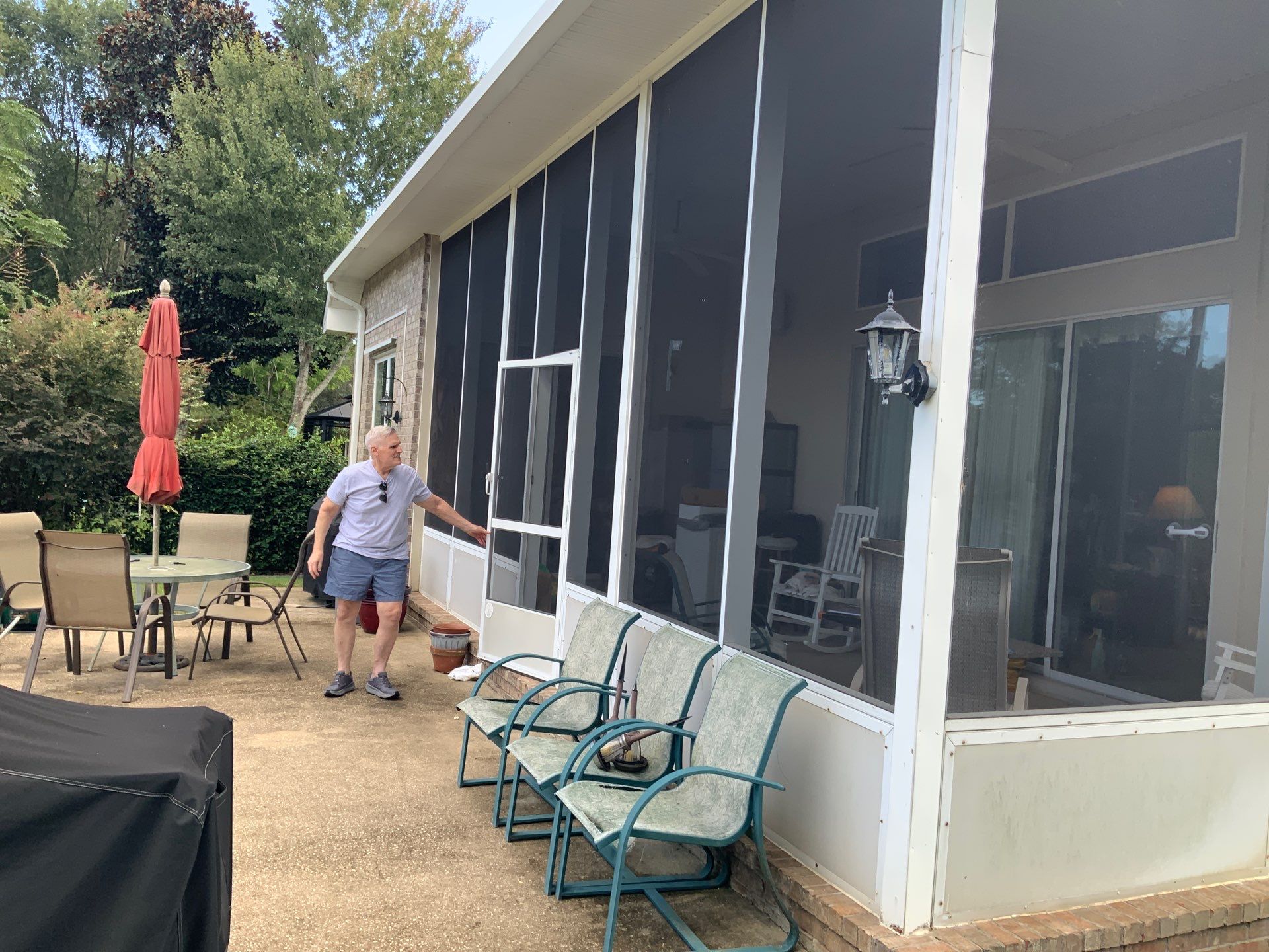 Screen Room Conversion to Glass Under  by Titan Sunrooms