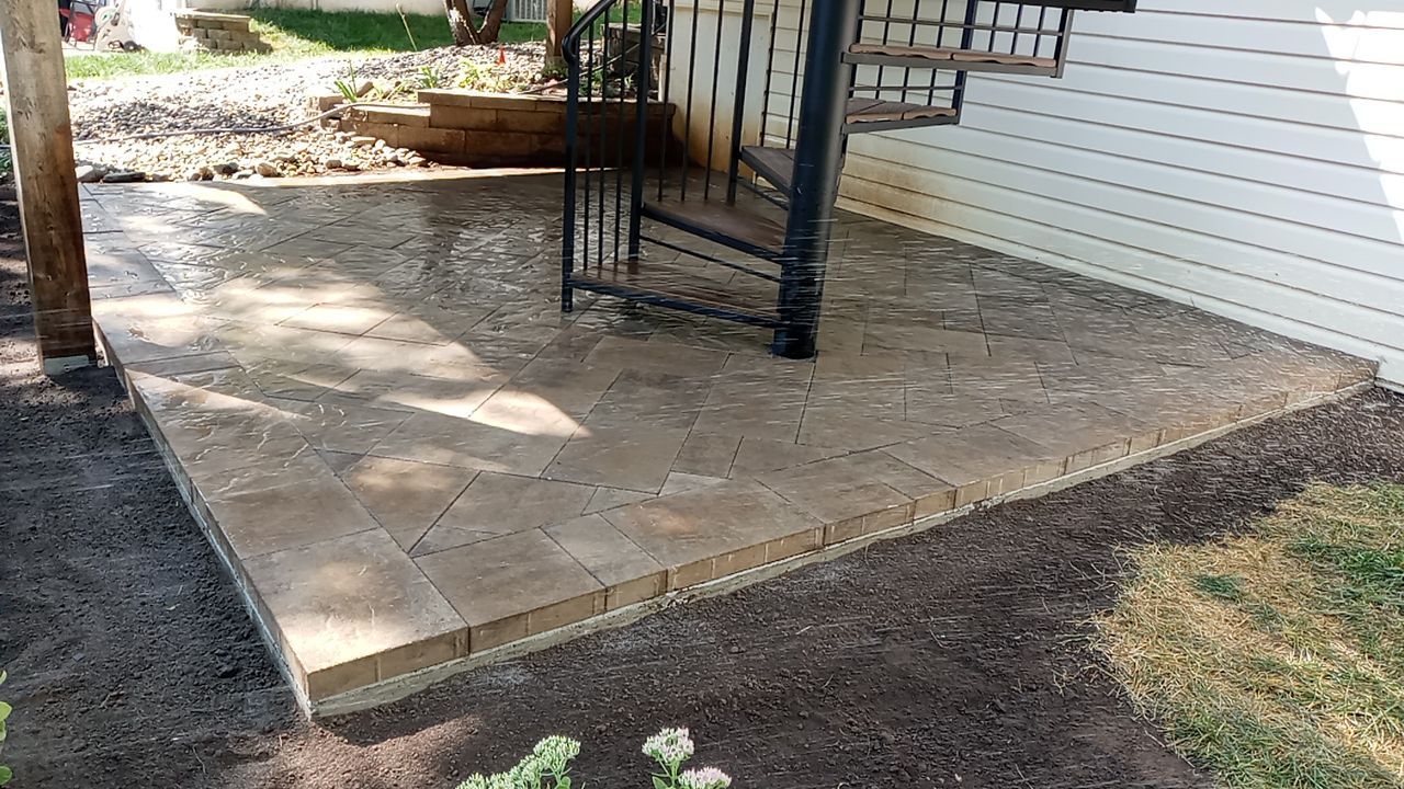 Back Yard Paver Patio by LAND ESCAPES LLC