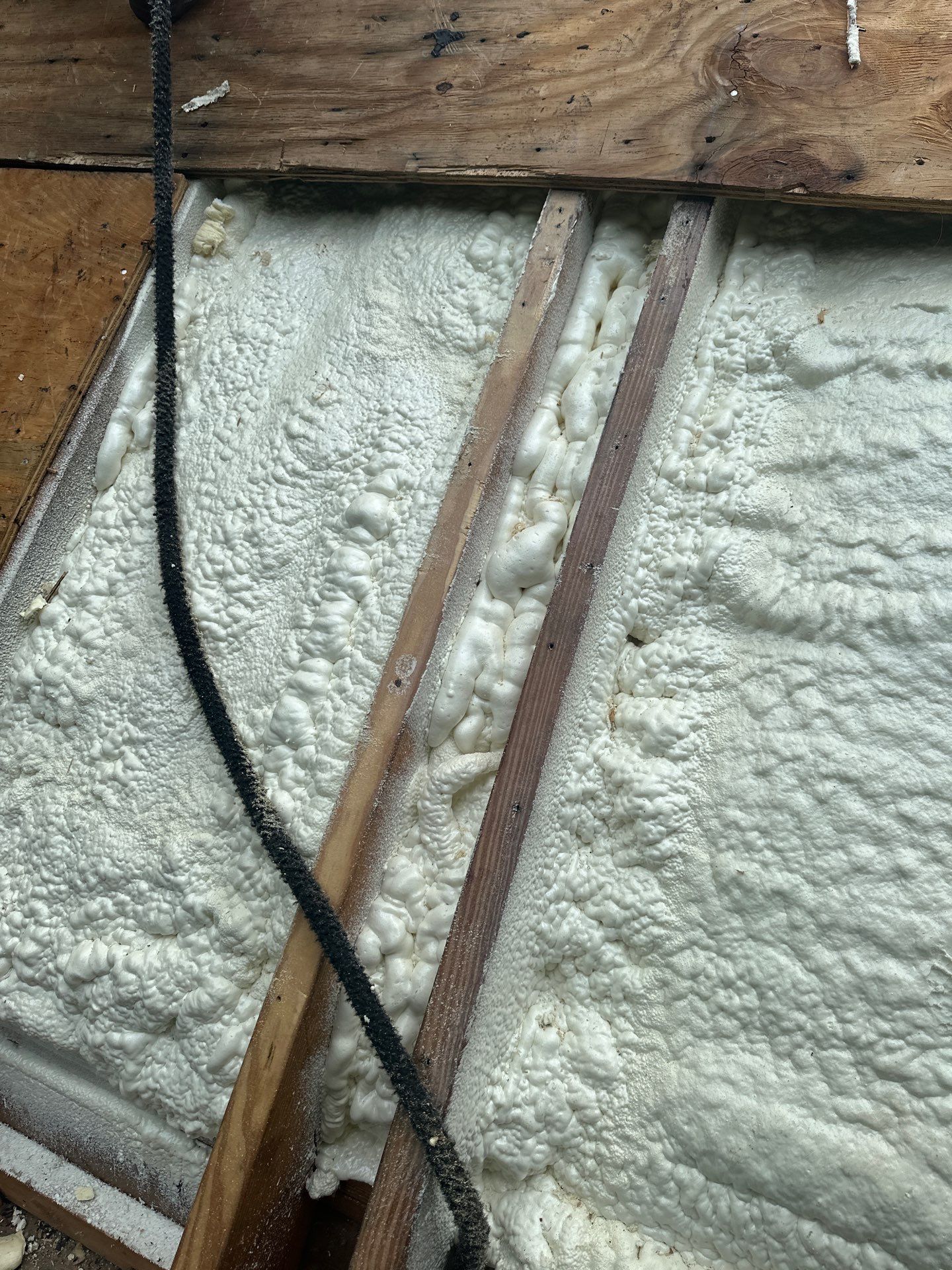 Exterior Installation using Closed Cell Spray Foam by NYS Foam & Energy