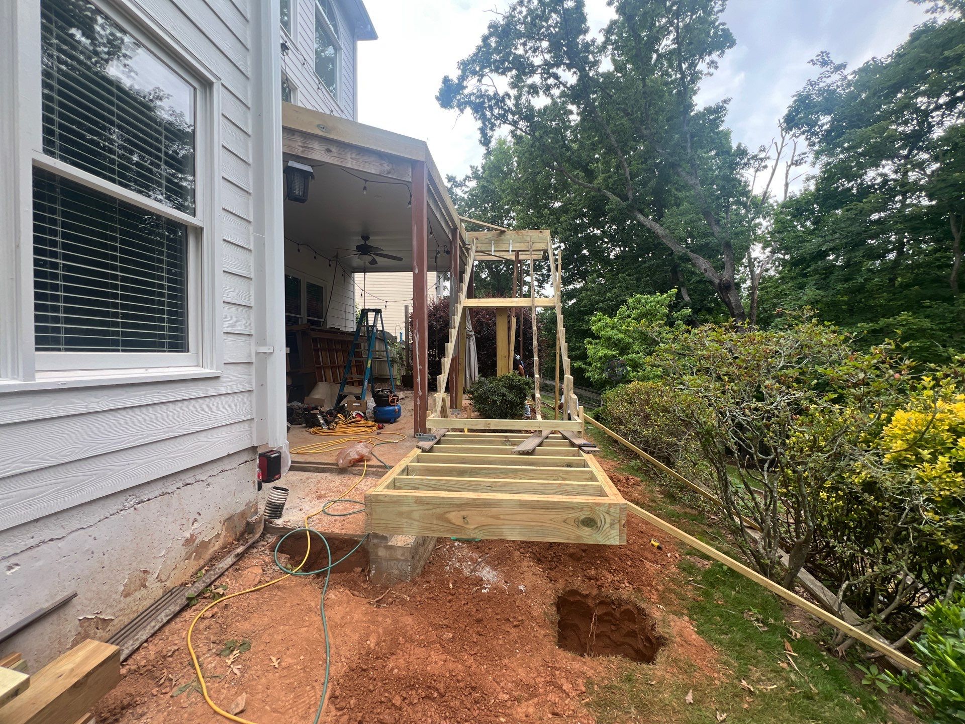 Elevated Composite Deck and Concrete Landing Installation in Kennesaw by Swift Home Renovations