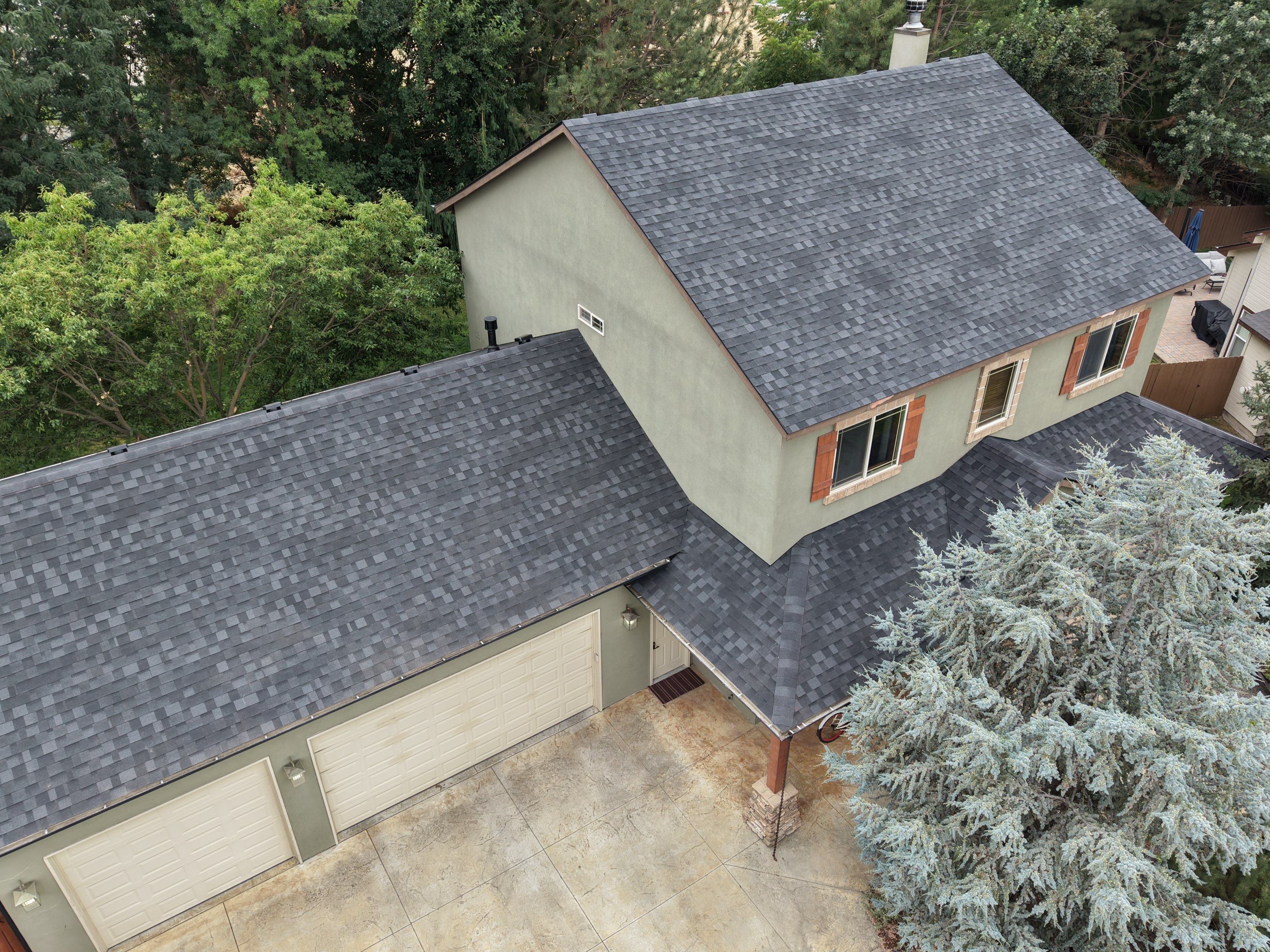 Residential Roof Replacement for Two-Story Stucco Home in Star by Olive Roofing