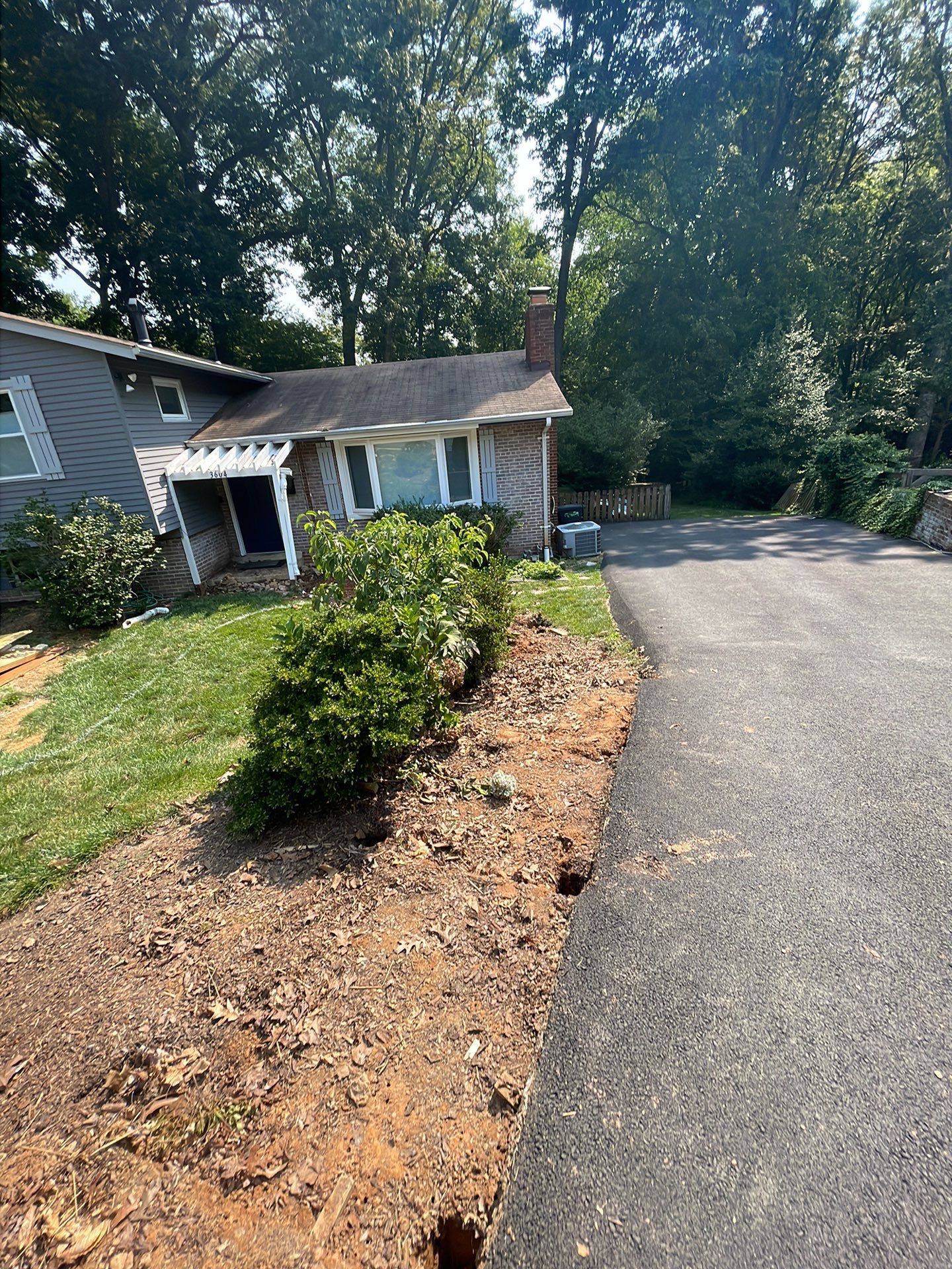 New walkway with stairs and a new front porch by Fairfax Contractors, LLC