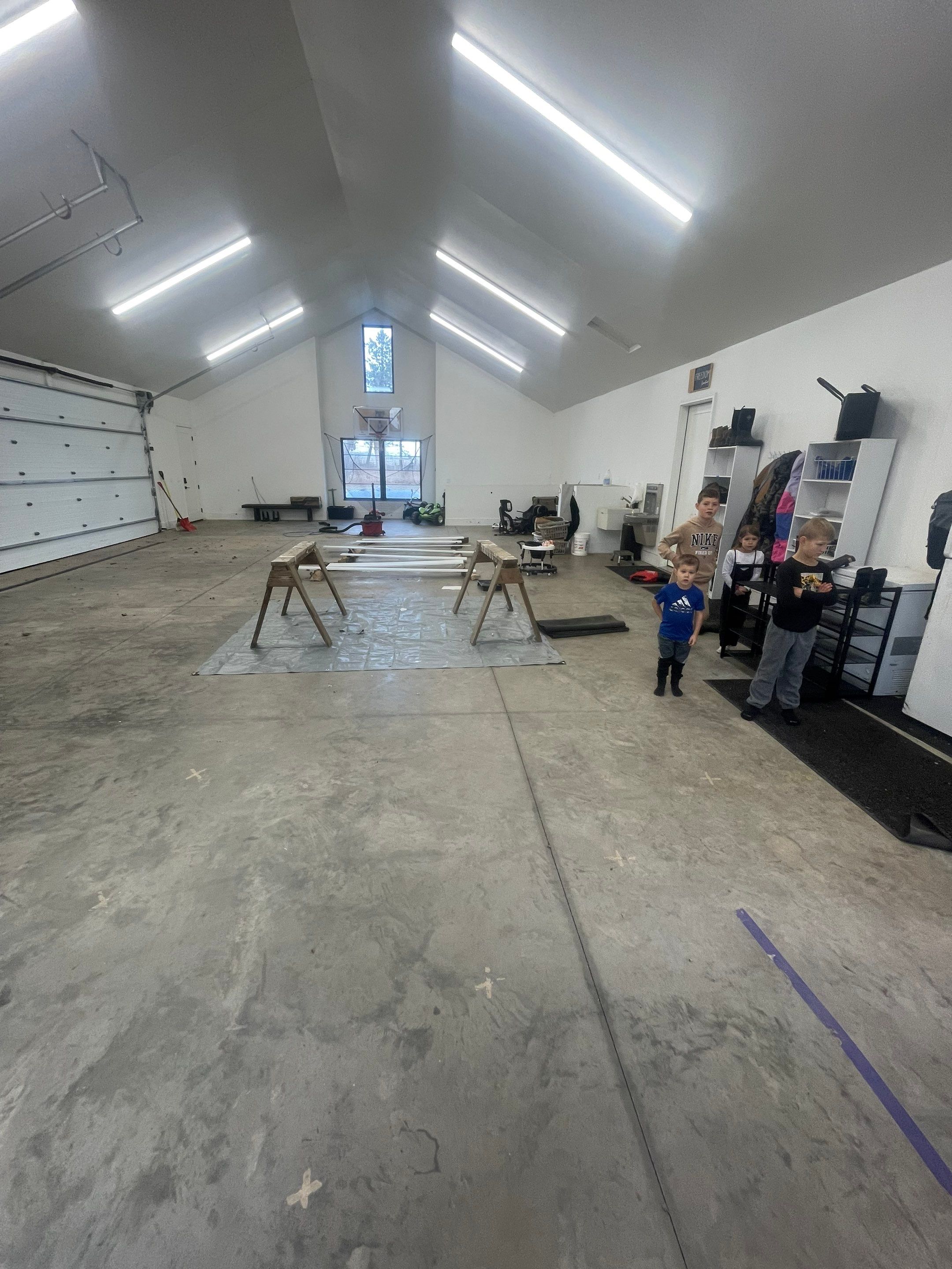 Epoxy Flake Garage Floor and Stair Coating in Sioux Falls by Select Painting, Coatings & Garage Cabinets