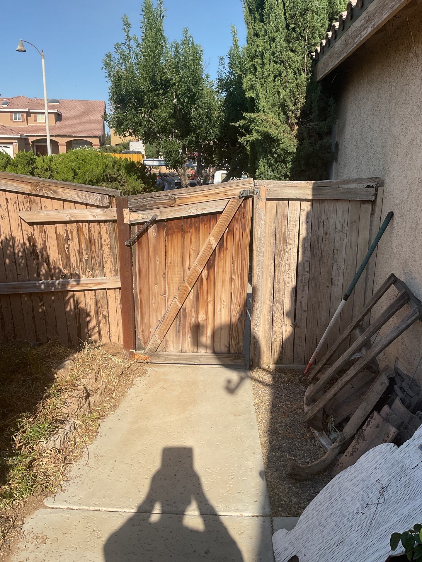 Gate installation using Vinyl by Fence Guys Inc. 