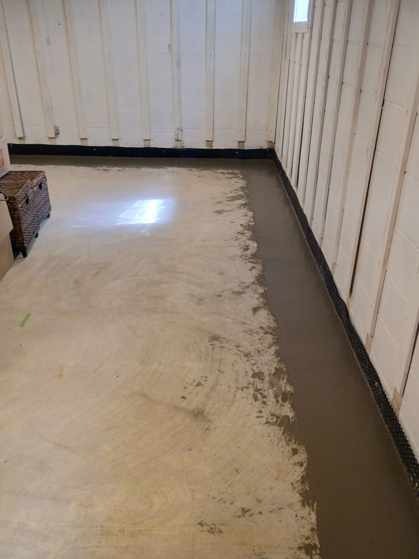 Interior Drain Tile & Buried Discharge in St. Anthony, MN by Waterproofing Northeast