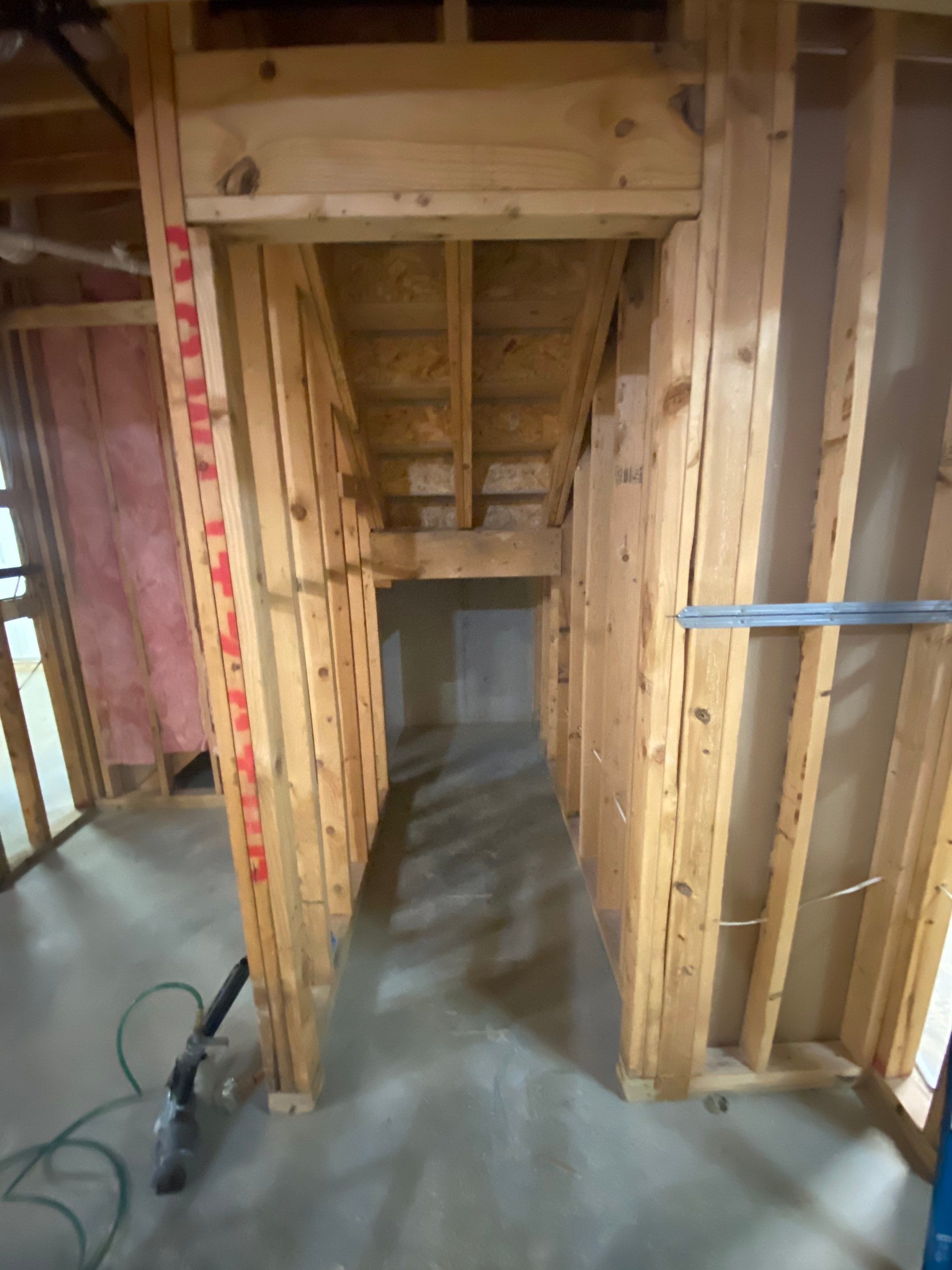 Acworth Basement Transformation With Wet Bar and Stone Fireplace by Swift Home Renovations
