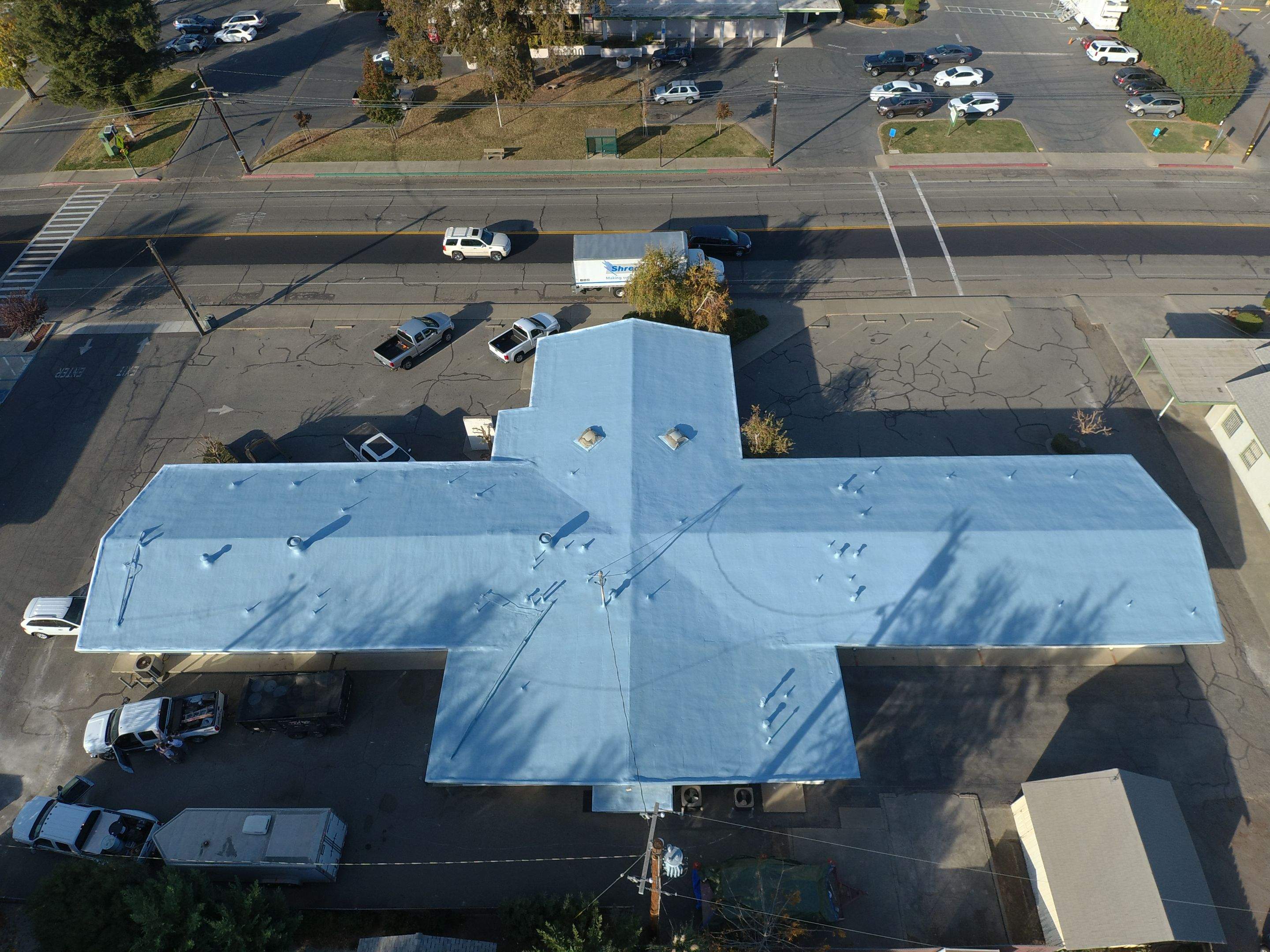 Spray foam and coatings using Conklin Benchmark/PUMA XL coatings and spray foam by Straight Edge Roofing Inc