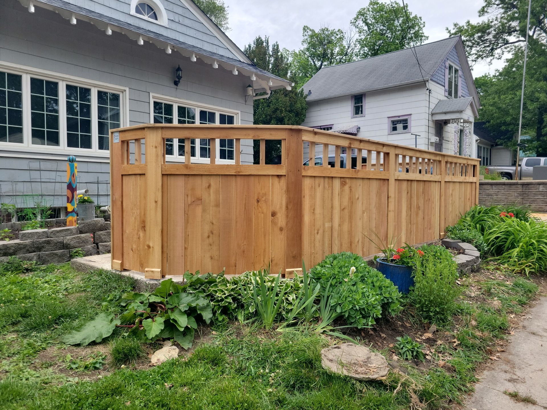 Custom Cedar Patio Fence in Waterloo by Perfect Picket Fence and Stain
