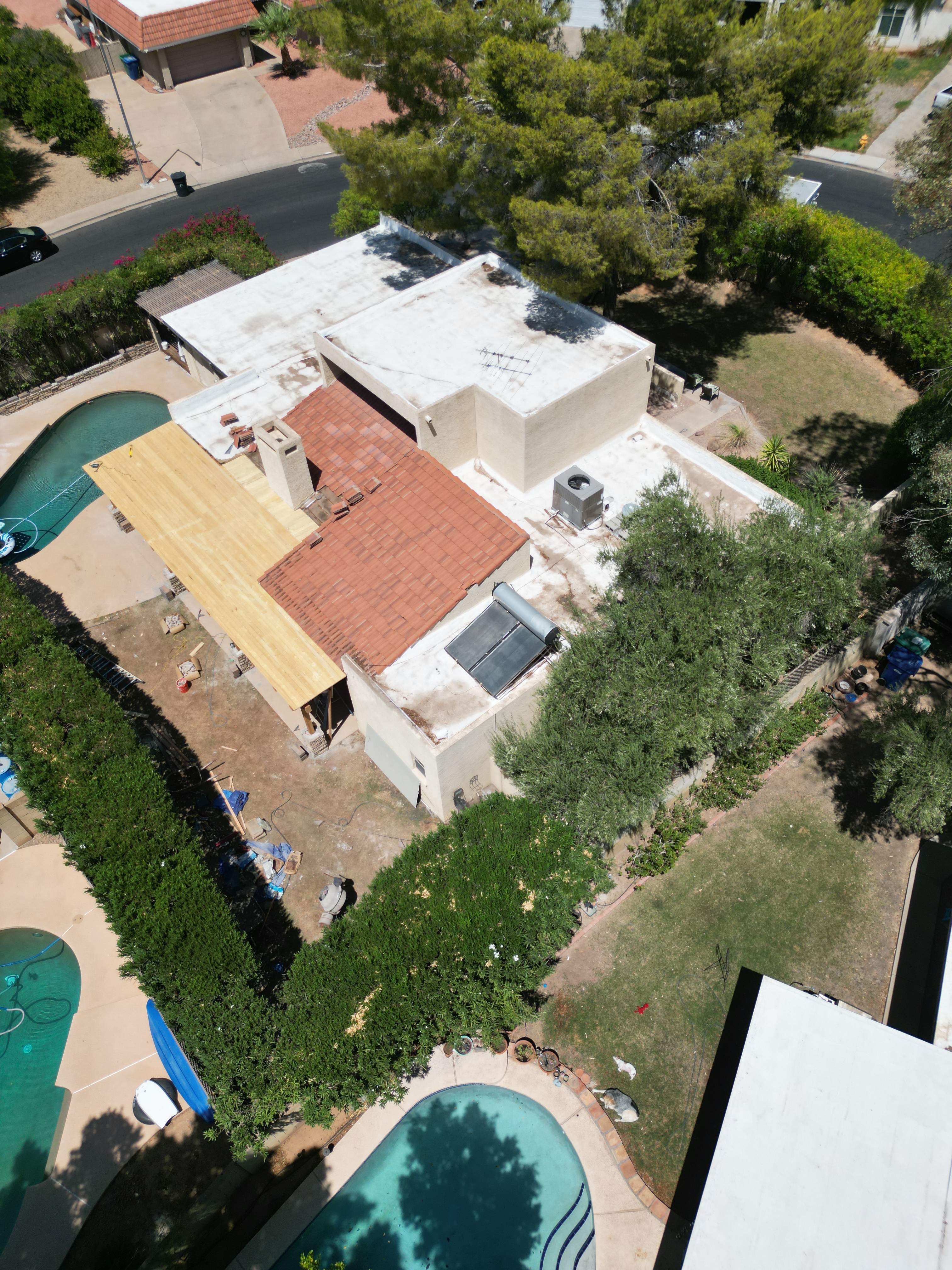 Re-coat & Tile Job by All Storm Roofing & Construction