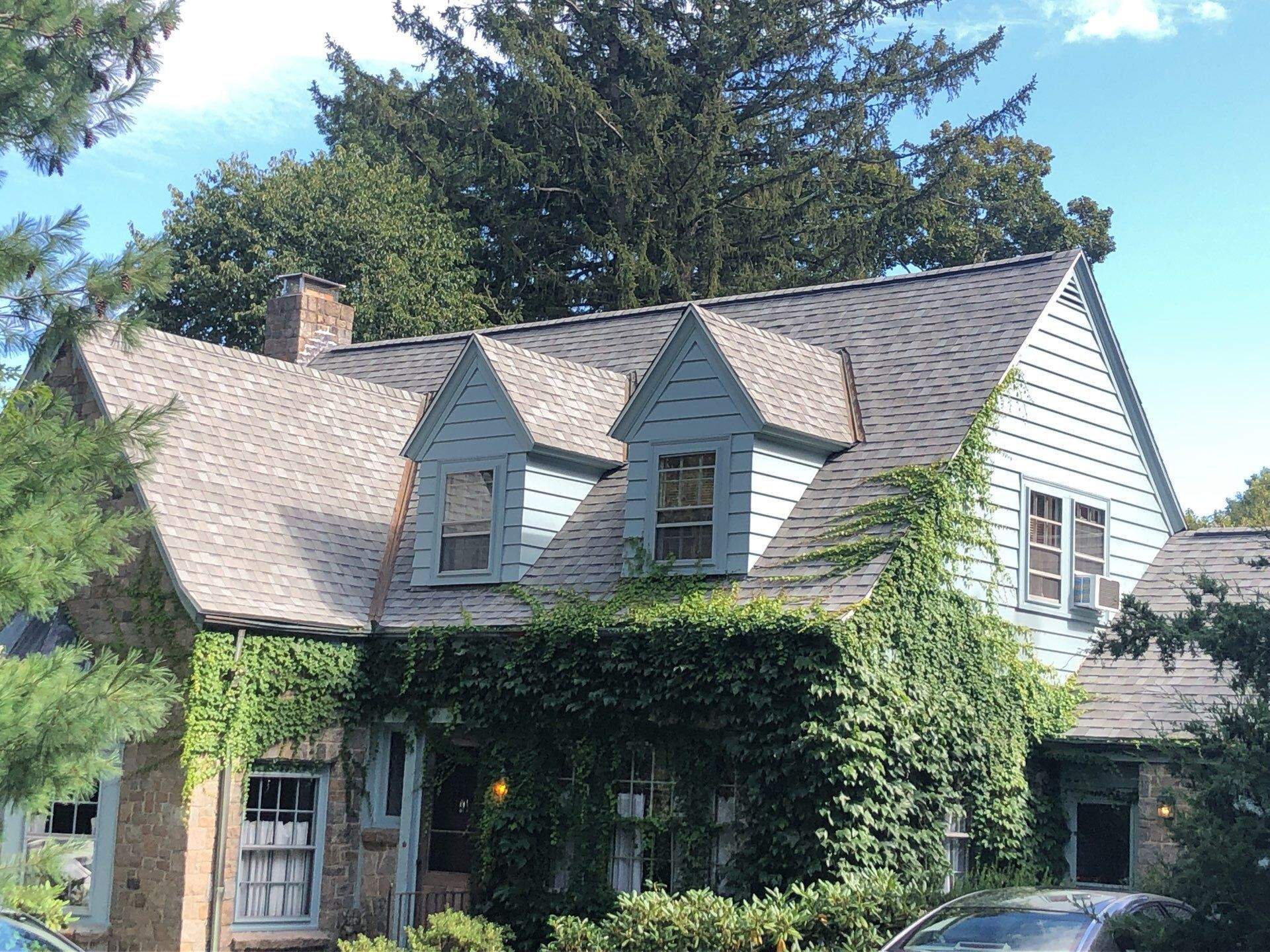 Cobblestone Gray Roofs by Pinnacle Roofing & Skylights