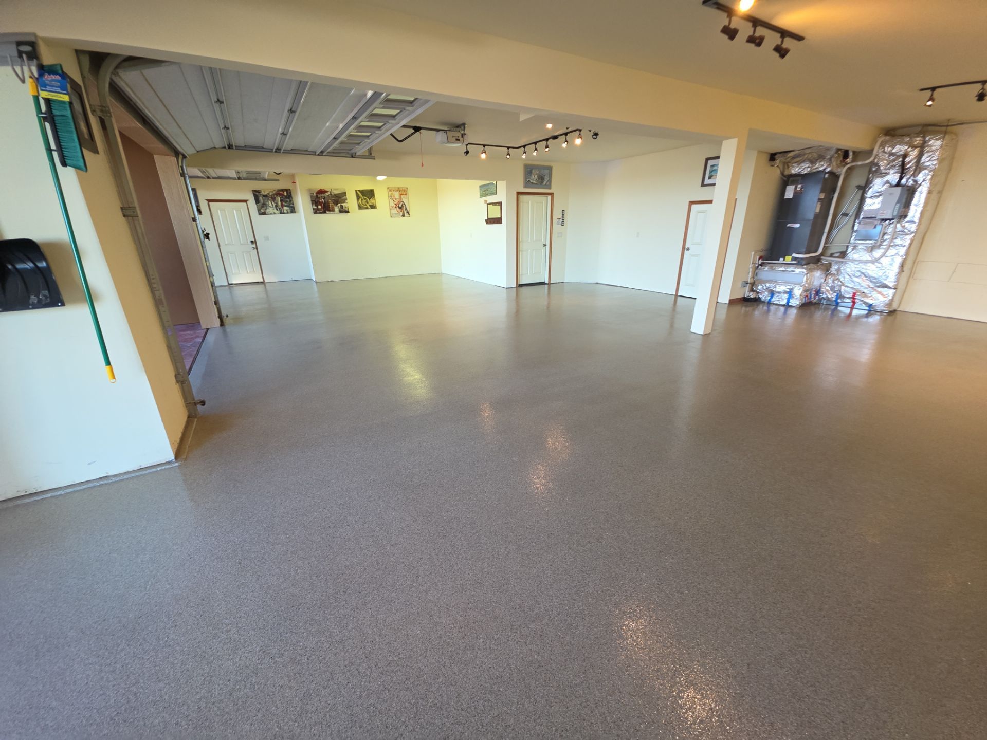 Garage Transformation using Stone/Marble Hybrid by Croc Coatings, LLC