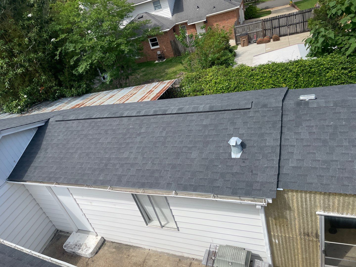 Residential Roofing Installation using Roof Replacement by American Roofing & Construction LLC