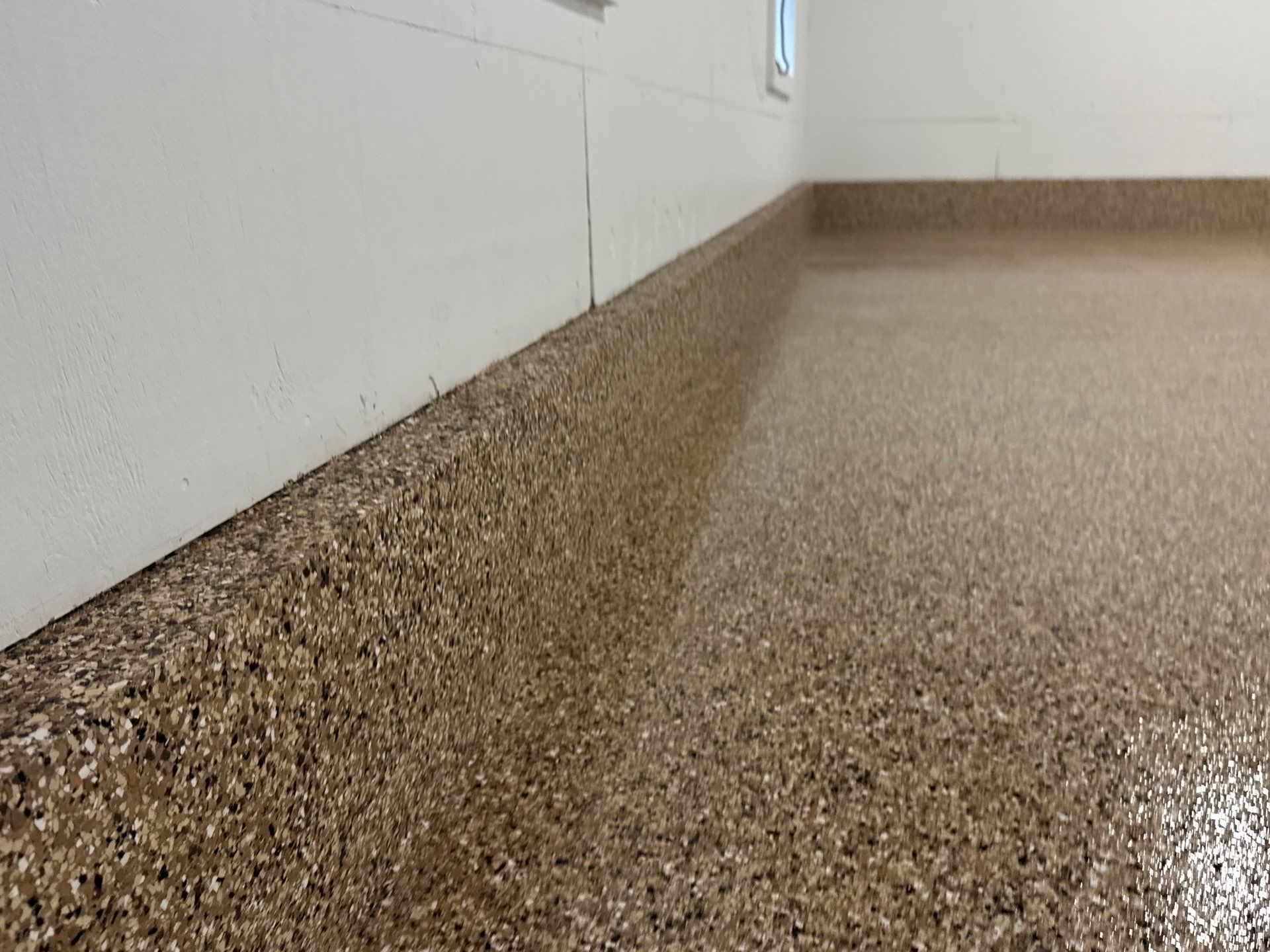 Garage in Gainesville, FL in Sandstone by Cross Creek Concrete Coatings