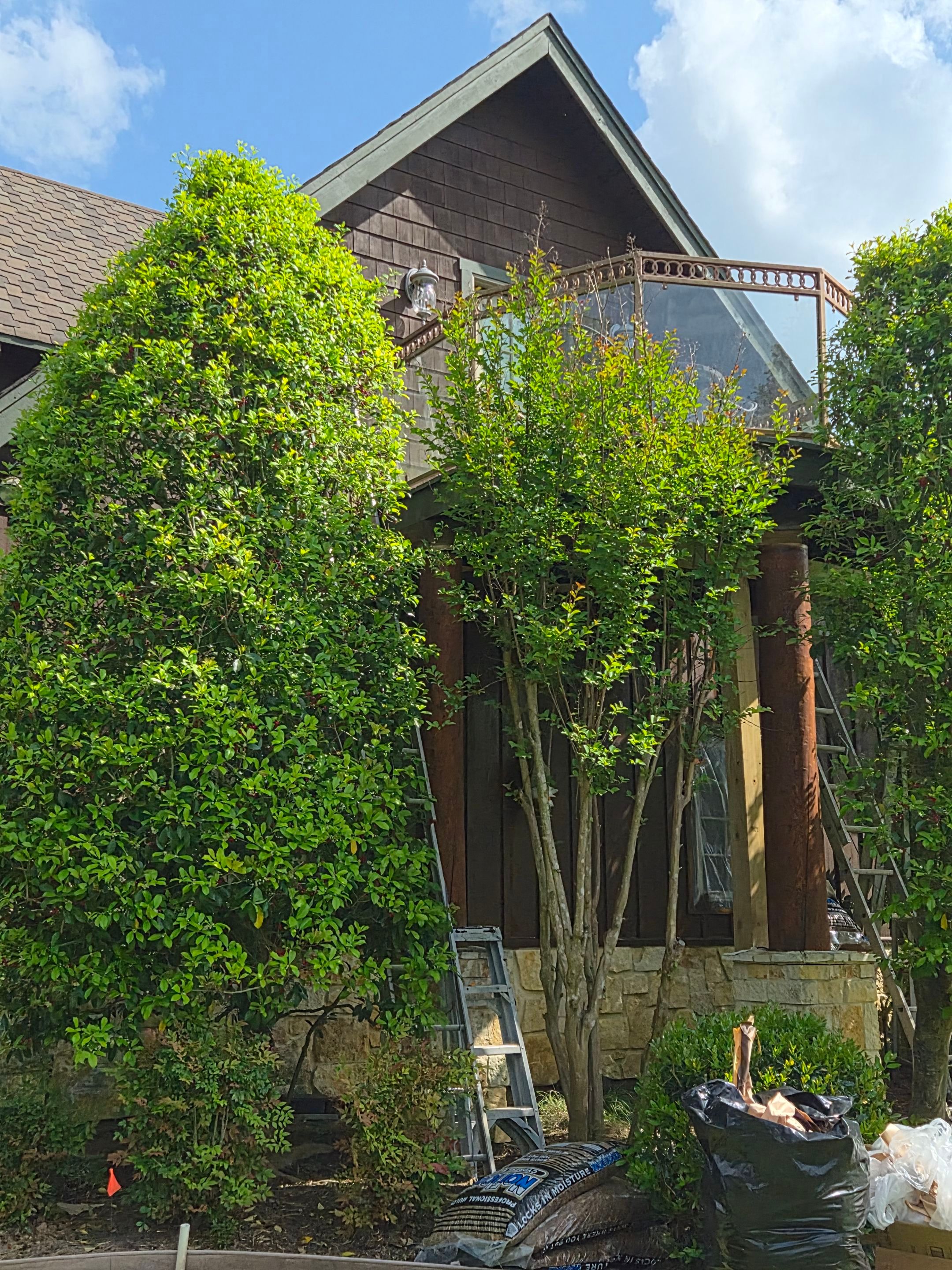 A Complete Exterior Refresh for a Custom Log Home & Property in Alba, Texas by Quality Coats Painting
