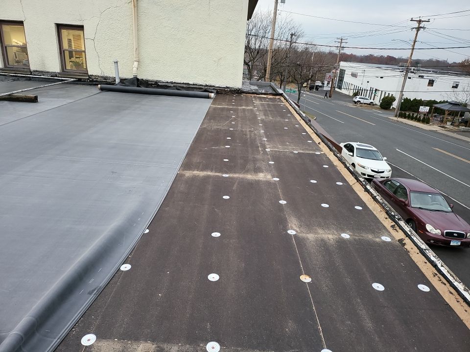 Commercial Roofing Installation using EPDM  by A Plus Exterior