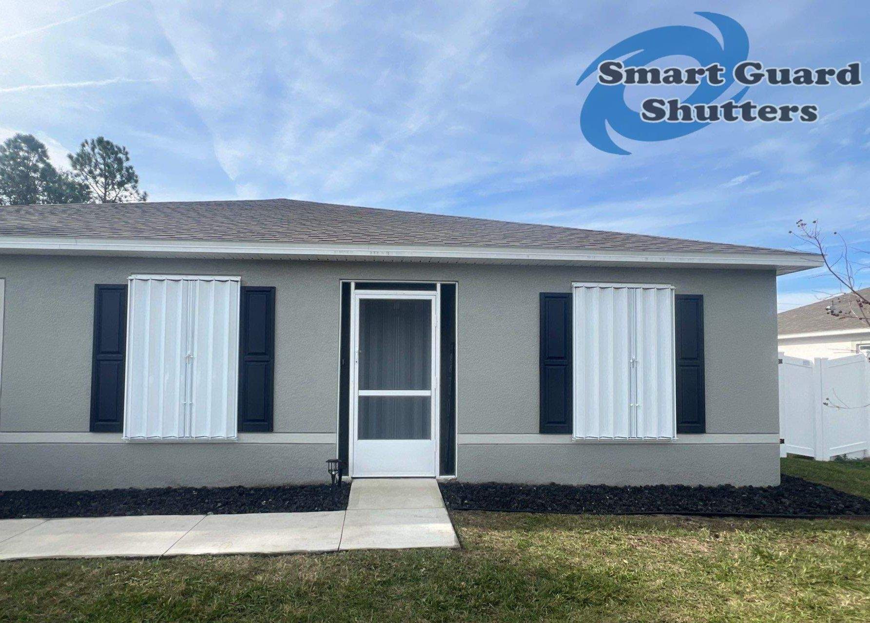 Accordion Shutters in White by Smart Guard Shutters