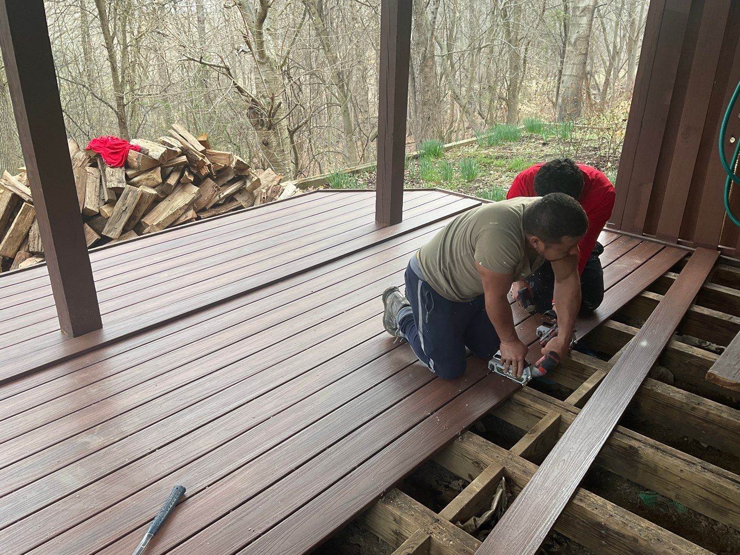 Deck Installation using New Composite Deck Board by Alpha Design Services