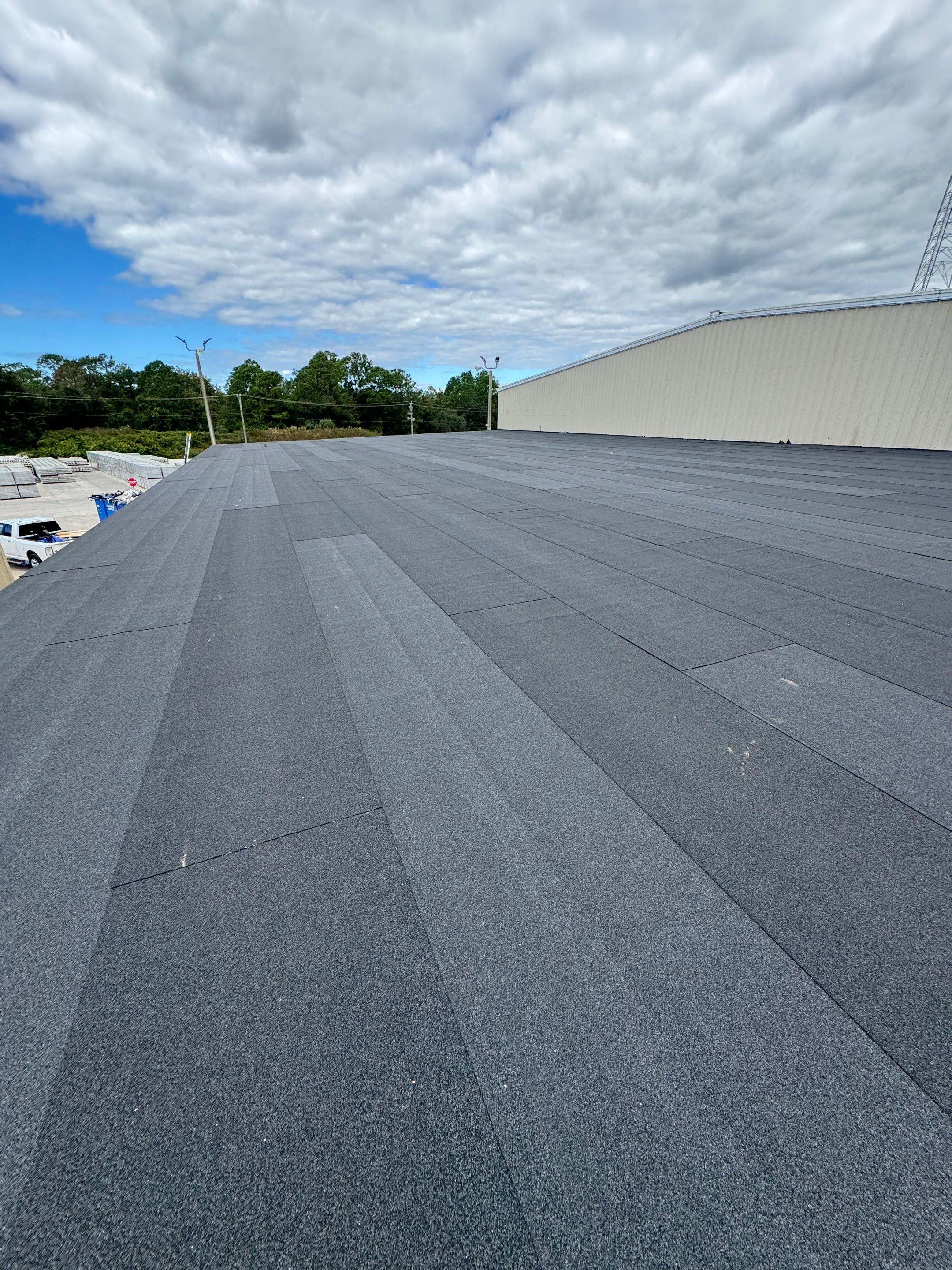 Flat Reroof Replacement Bunnell FL by Pinnacle Roofing Group