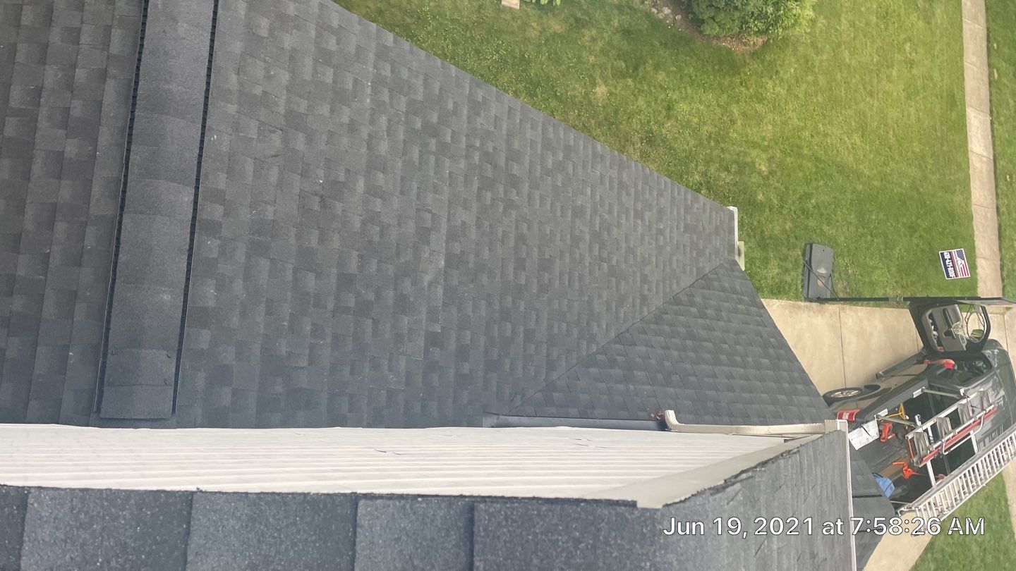 Exterior Home Makeover using GAF Timberline HDZ, GAF Decotech, and James Hardie Siding by American Home Contractors