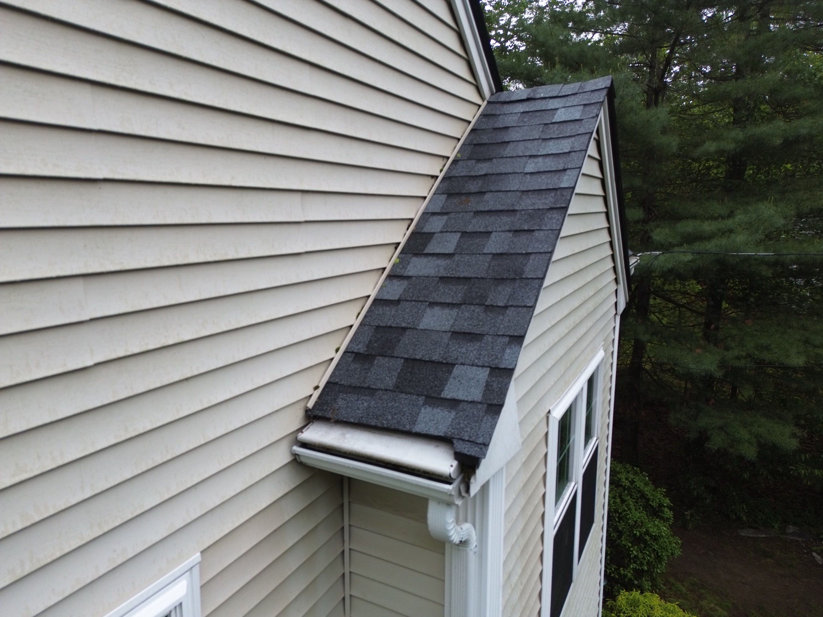 Leak Repair & Gutter Replacement in Chelmsford, MA by Mighty Dog Roofing of Greater Middlesex County