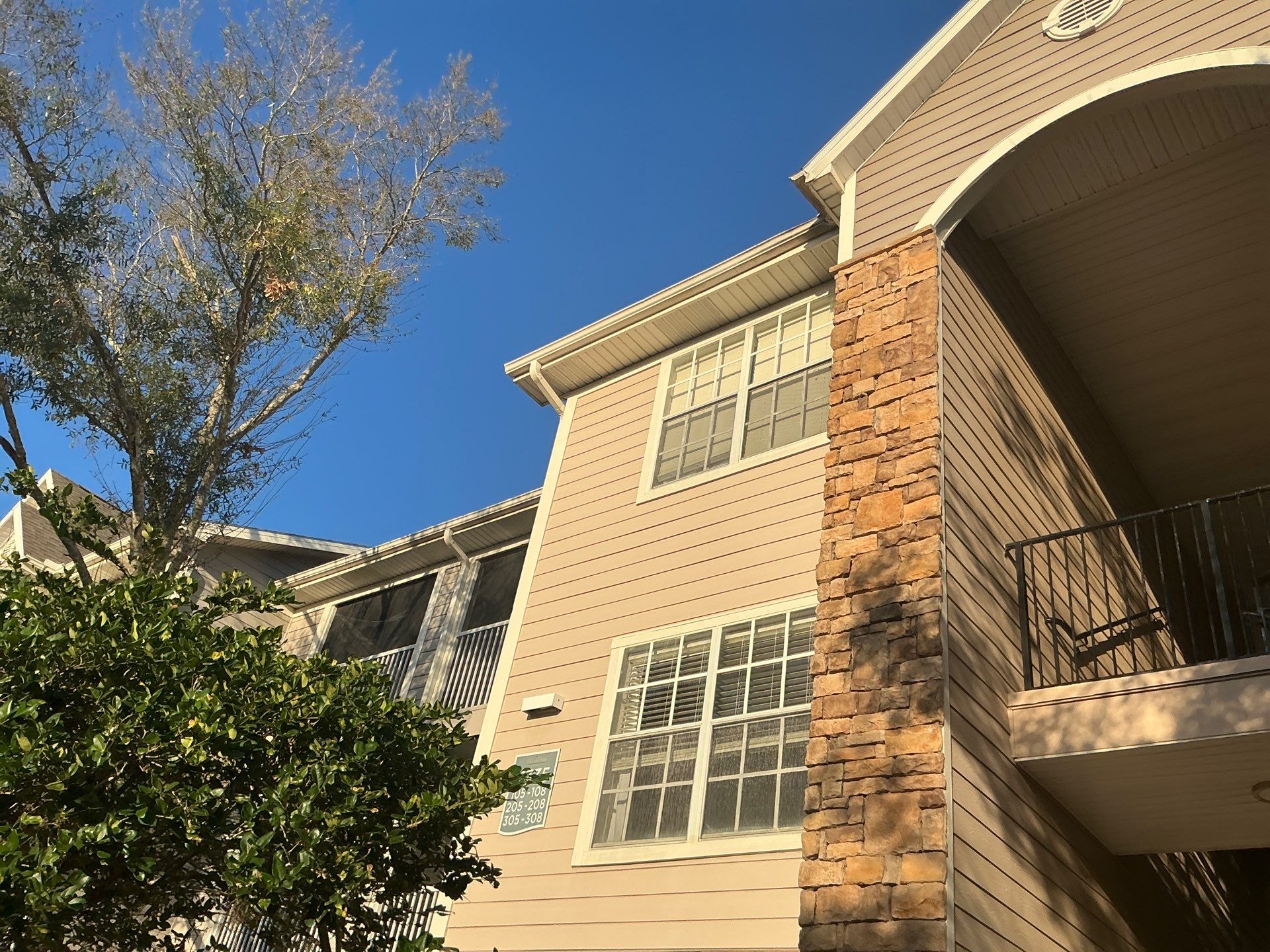 Downspouts for the High Buildings in Tampa FL by Gutter Professors