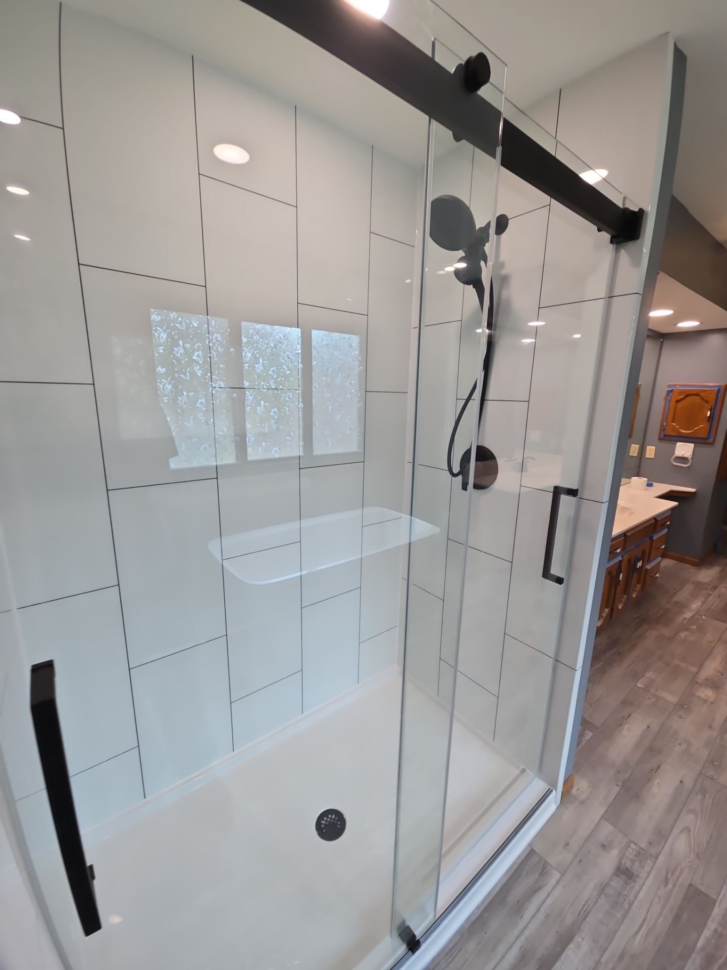 Full bathroom remodel, all new except vanities by The Shower Company