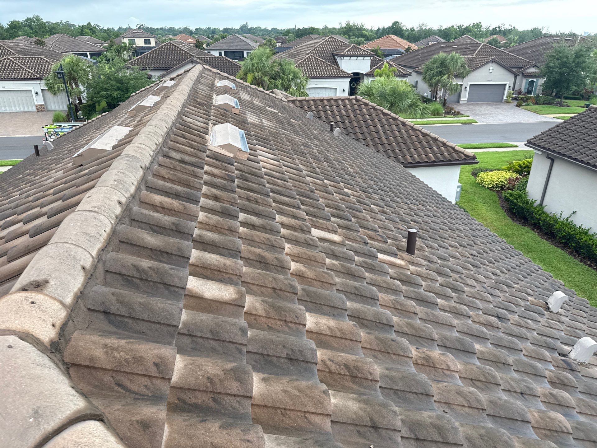Concrete Tile Roof, Paver Driveway & Lanai Cleaning – Artisan Lakes Esplanade, Palmetto, FL by Sunshine AquaWash