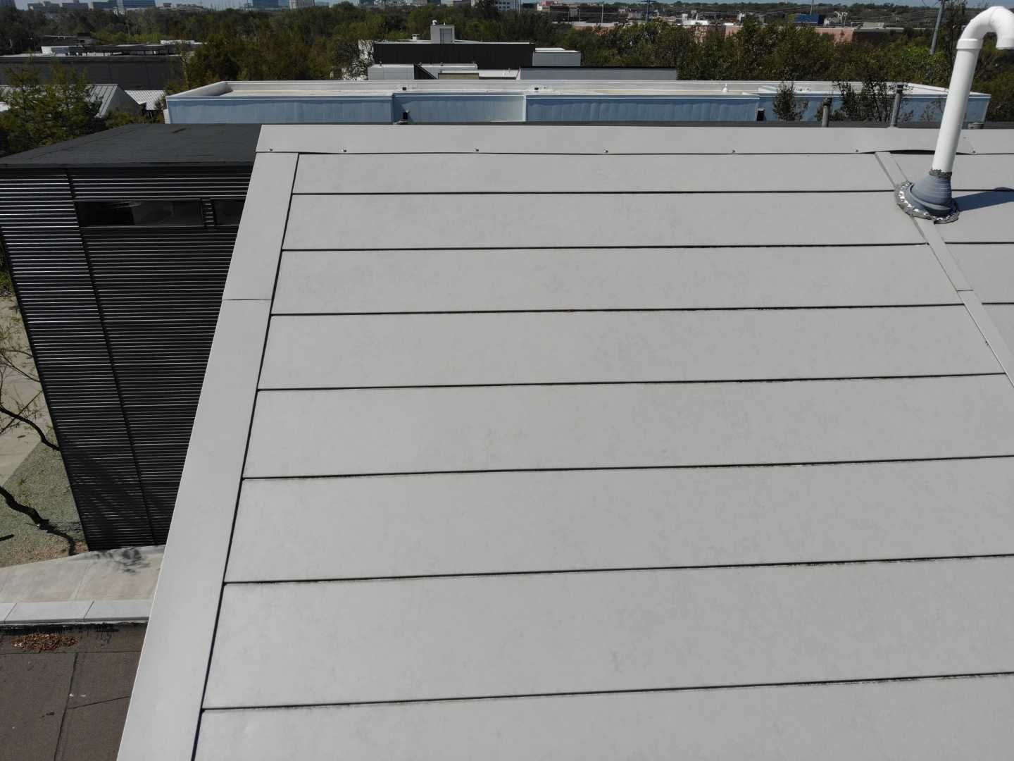 Metal Roofing project using MBCI Flexloc Panels - 22 gauge - silver metallic-in-color by Becker Roofing and Exteriors