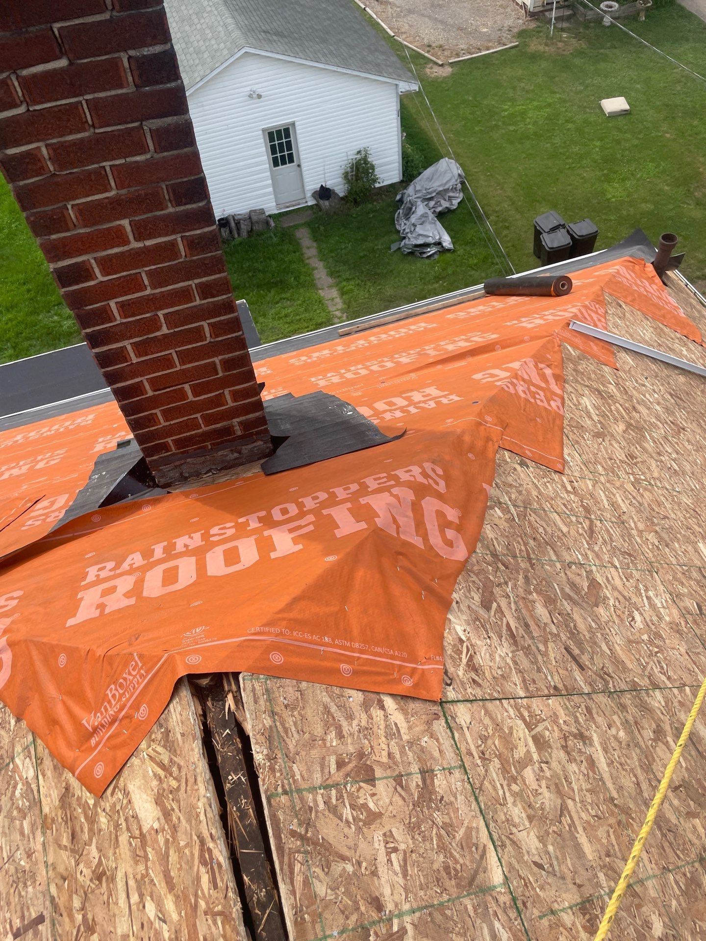 Residential Roofing Installation using GAF Timberline HDZ Charcoal by Rainstoppers Roofing