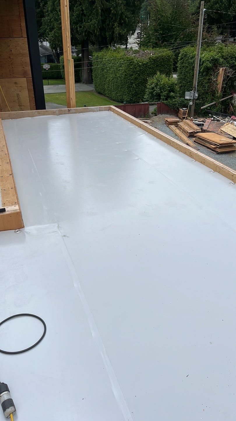 Residential Roofing Installation using Durolast roofing membrane by Top Notch Roofing Inc