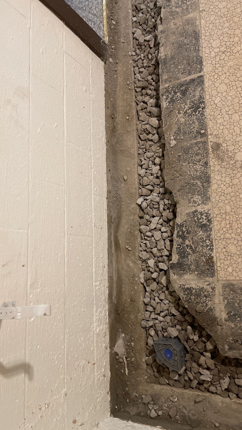Interior Waterproofing Using GrateDrain™ Products by Toledo Basement Repair 