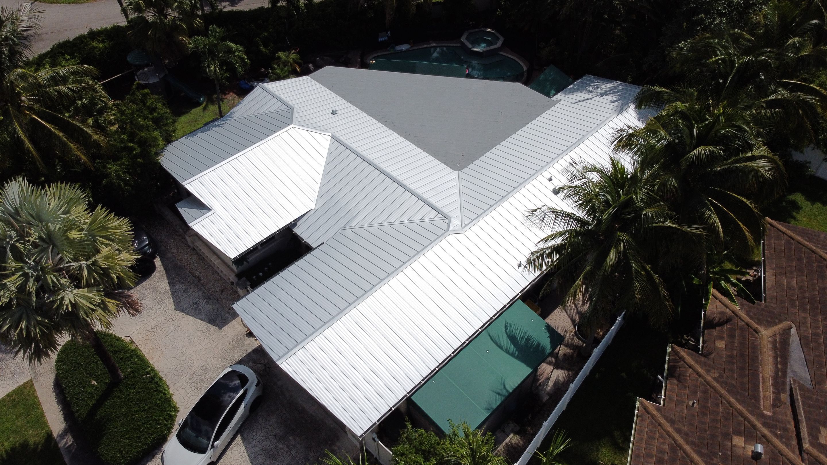 Residential Roofing Installation using 1" Nail strip metal roof by BLUES BROTHERS ROOFING