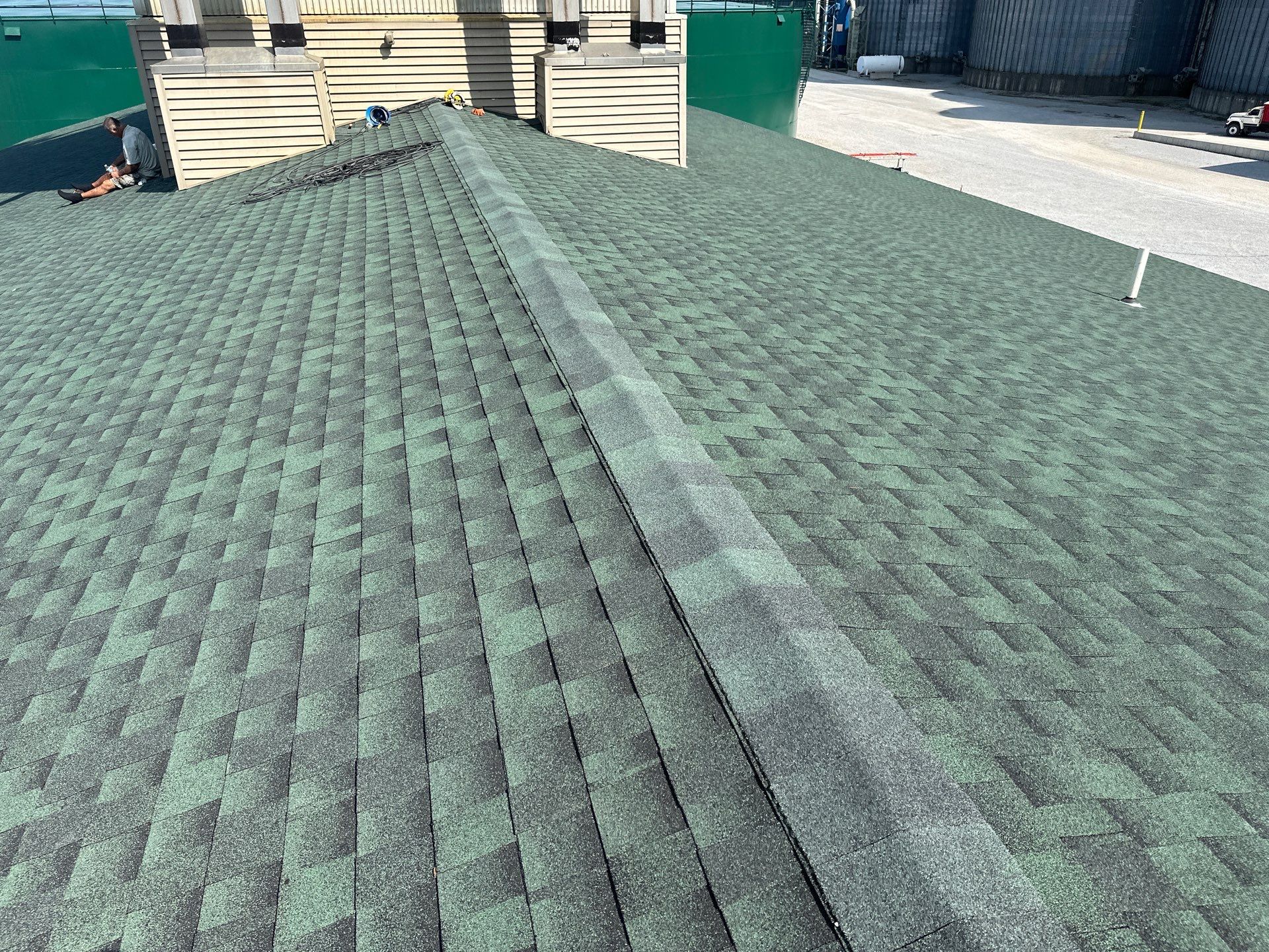 Commercial Roofing Installation using Timberline HDZ Shingles - Hunter Green by RoofX 