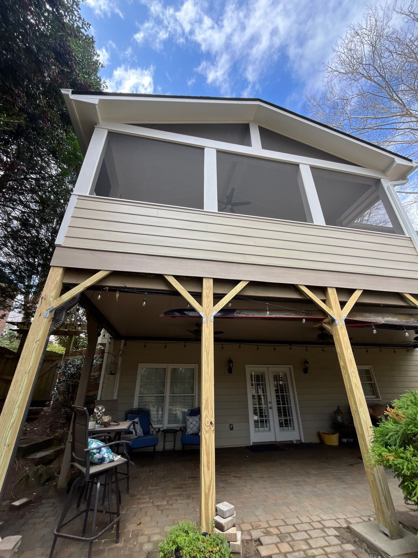 Deck Resurface and Screened-In Porch Build with Timbertech LED Lantern Post Cap Lights by Nelson Exteriors